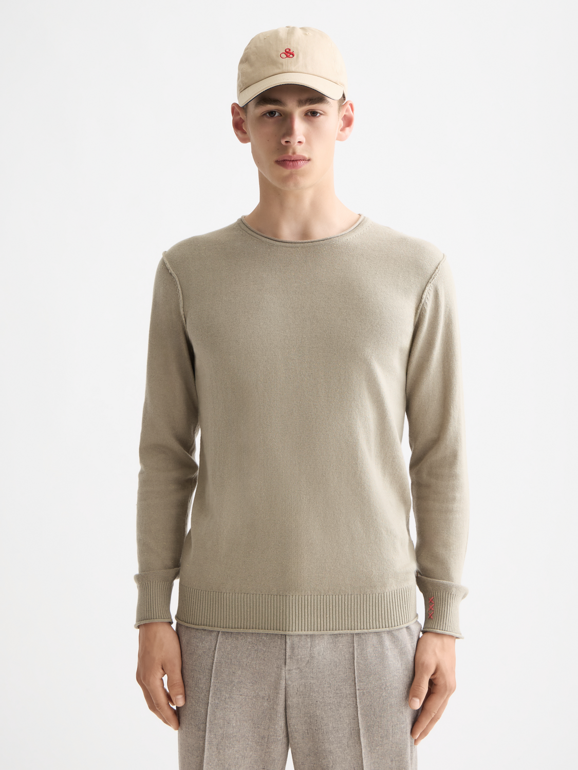 Close-up of a Scotch & Soda wool-blend pullover knitwear sweater showing textured fabric and classic crew neckline.