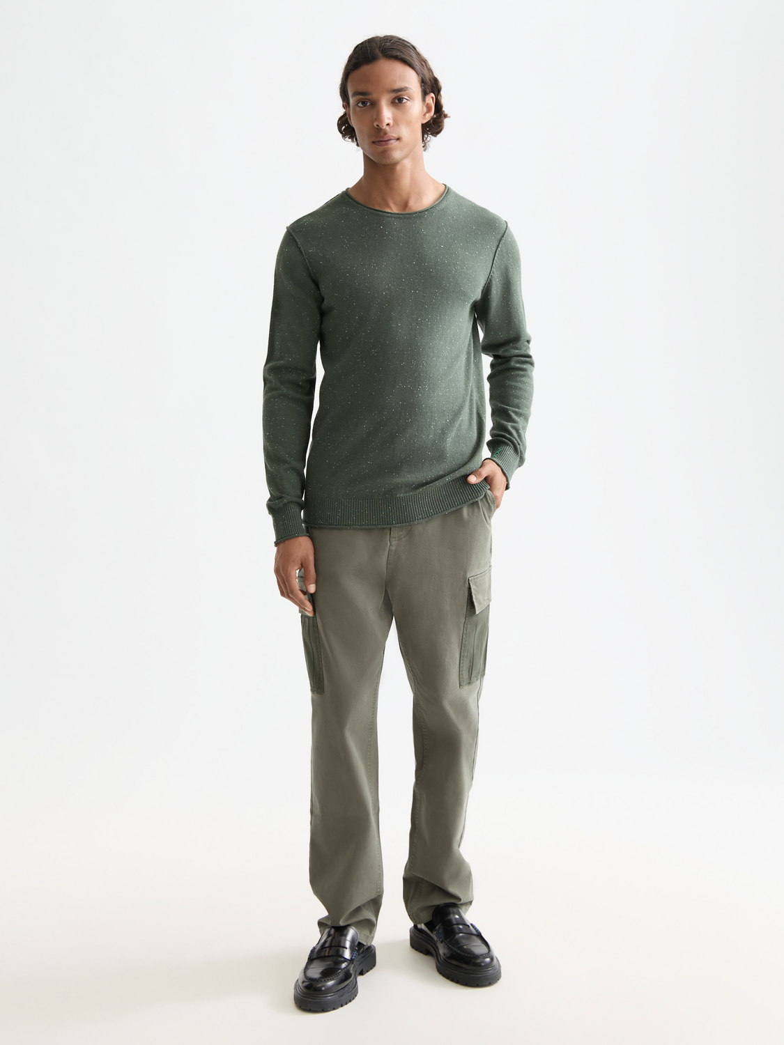 Wool-blend knit sweater by Scotch & Soda featuring a classic pullover design in neutral tones.