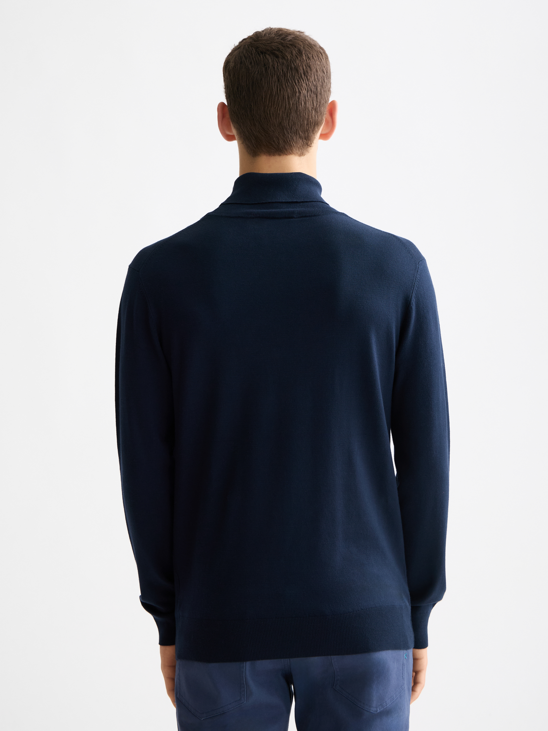 Scarlet knit turtleneck sweater by Scotch & Soda with ribbed collar and long sleeves, displayed on a plain background.