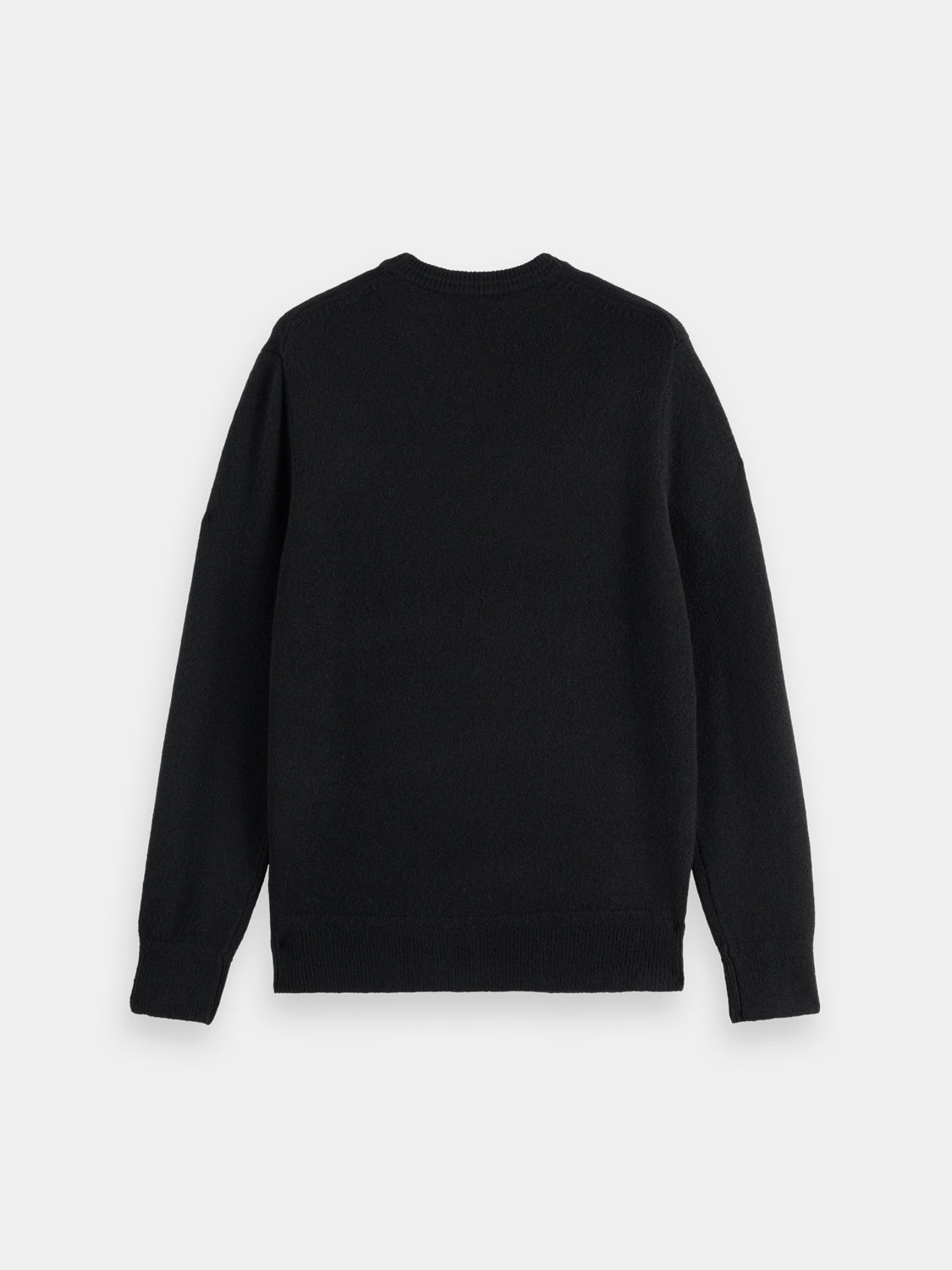 Soft knit pullover from Scotch & Soda featuring a cozy knitwear design in a dark color, displayed on a plain background.