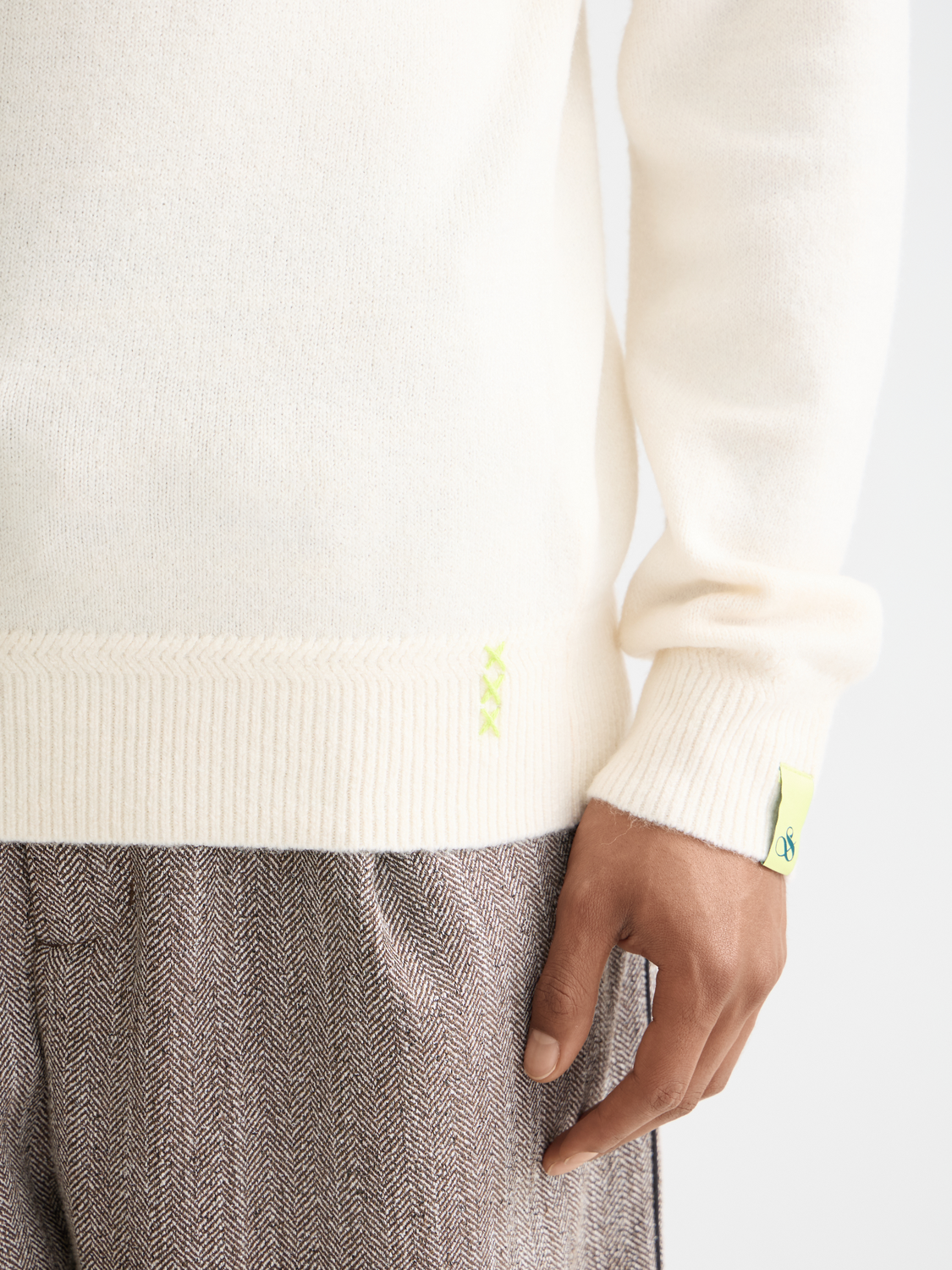 Soft knit pullover from Scotch & Soda, featuring a cozy knitwear design in a neutral color, displayed on a plain background.