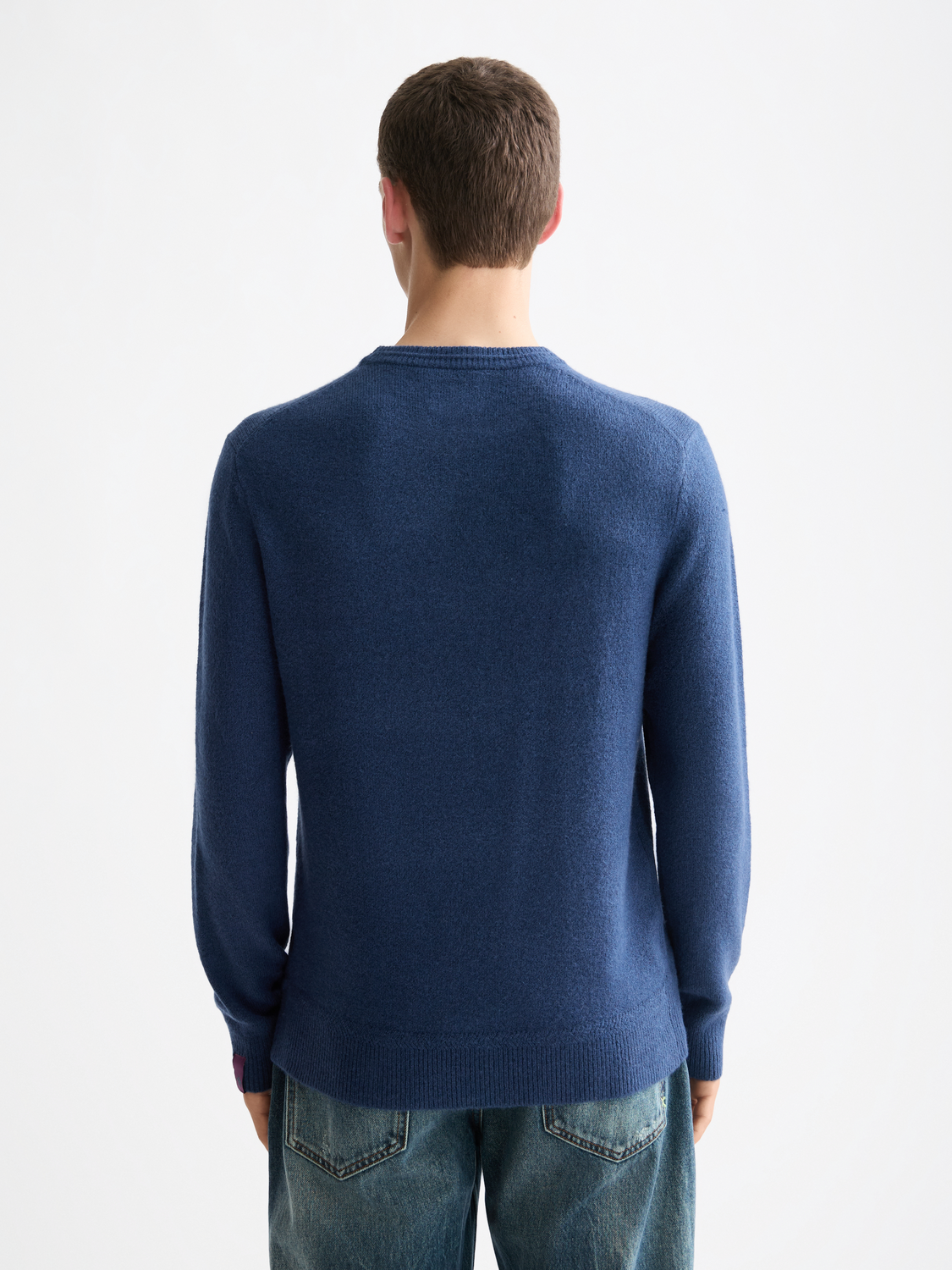 Soft knit pullover by Scotch & Soda, featuring a cozy knitwear design with a relaxed fit and ribbed cuffs.