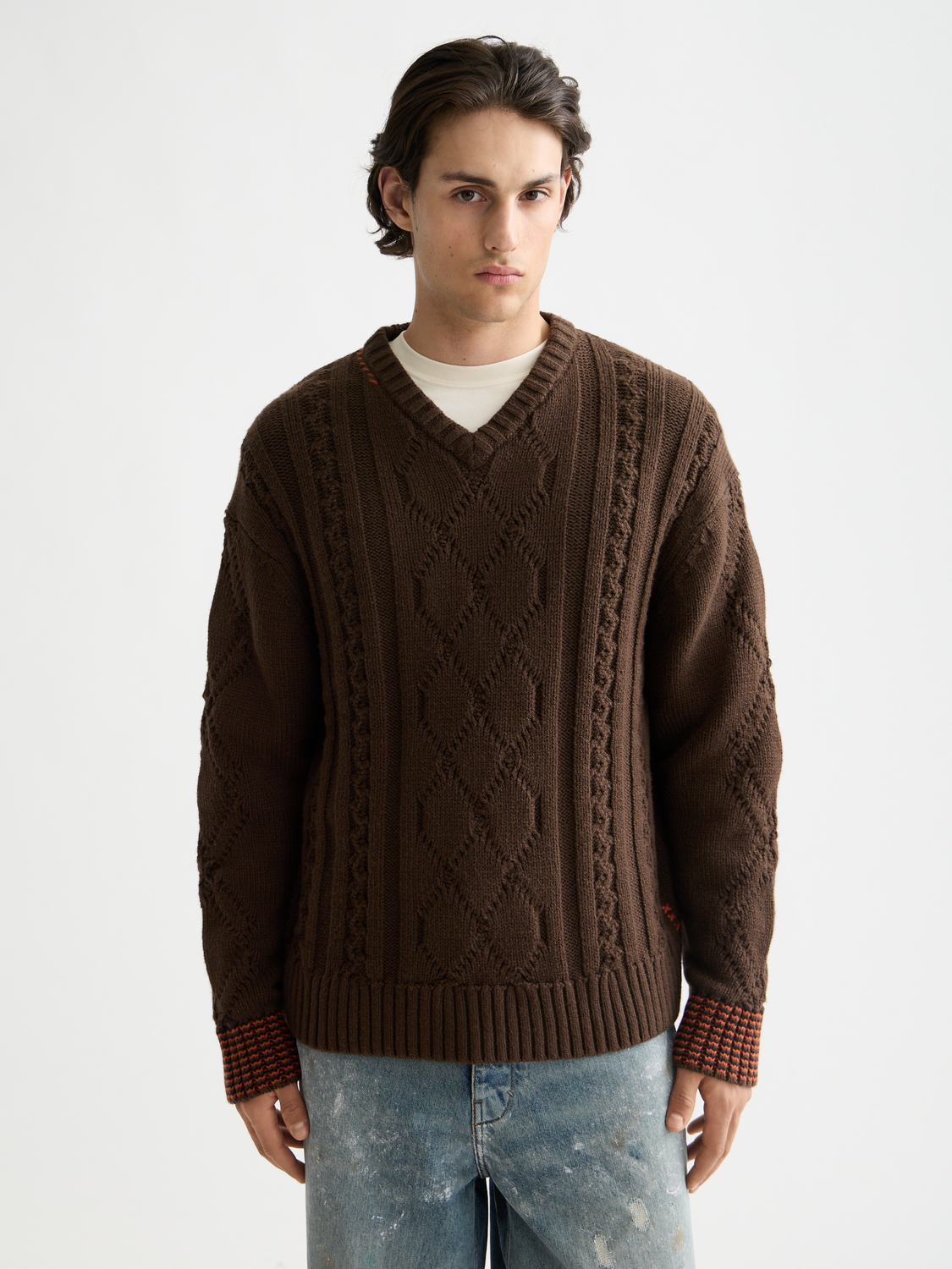 SCOTCH & SODA V-neck knitwear pullover in a neutral color, displayed on a hanger against a plain background.