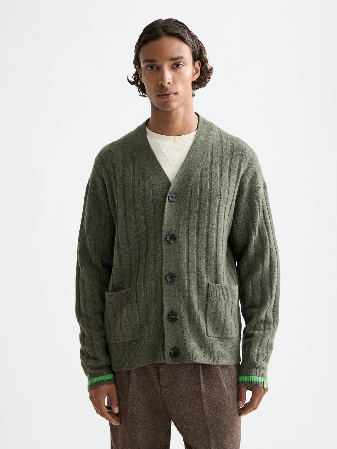 Cream knitted cardigan by Scotch & Soda, featuring a textured knitwear design and front button closure.