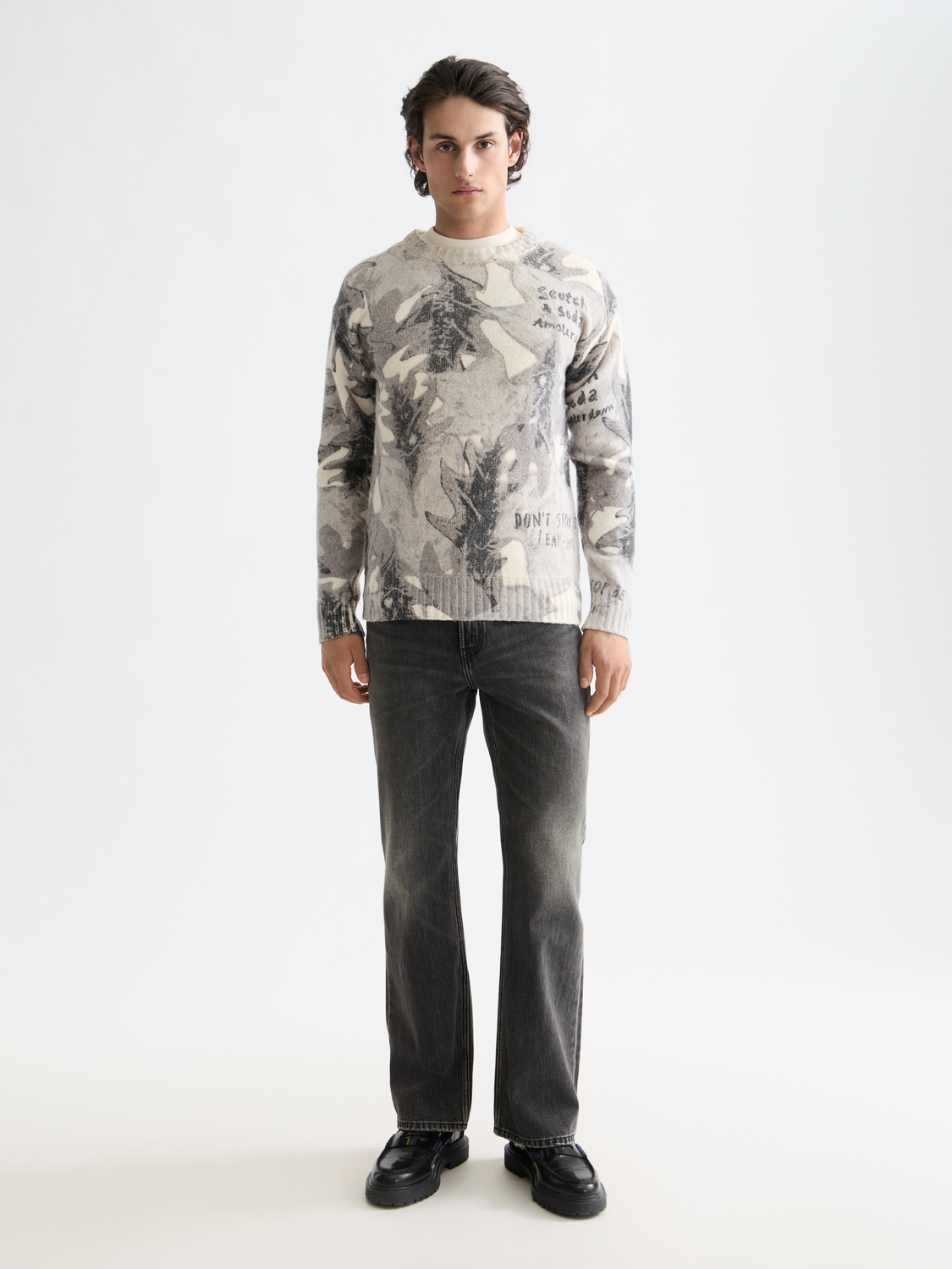 Printed SCOTCH & SODA knitwear pullover with colorful design, showcasing a cozy and stylish sweater for casual wear.