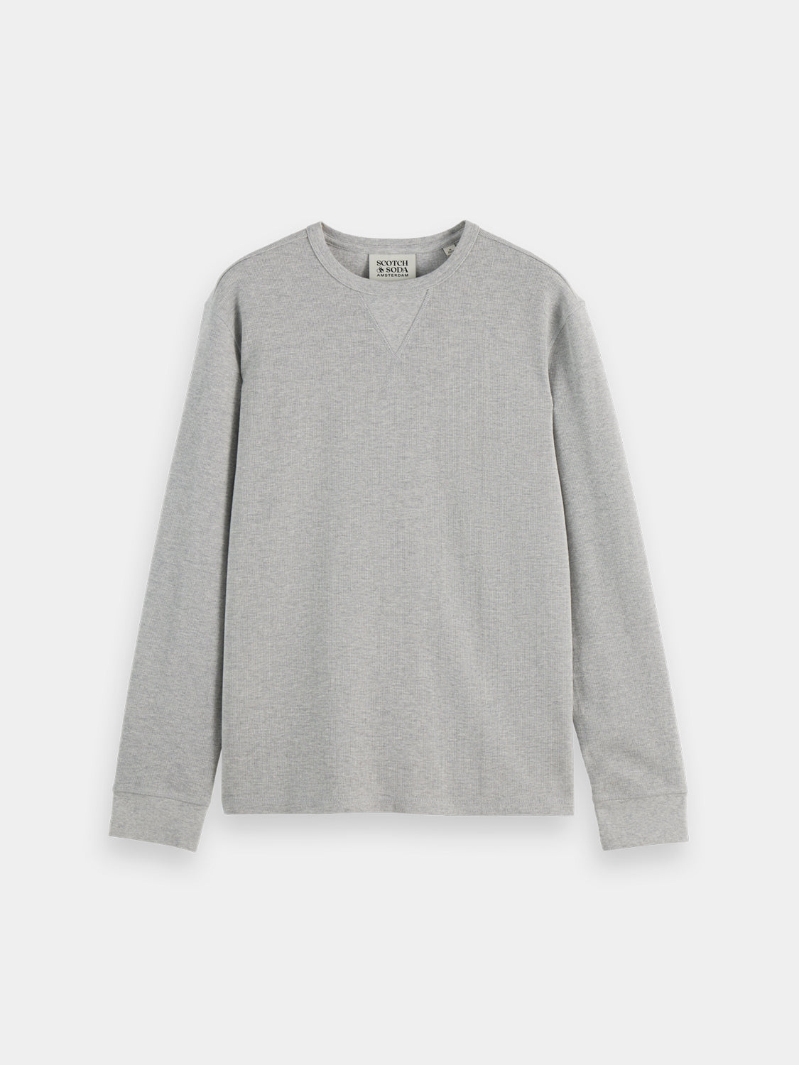 SCOTCH & SODA waffle long-sleeved T-shirt in beige with a relaxed fit and ribbed cuffs, displayed on a hanger.