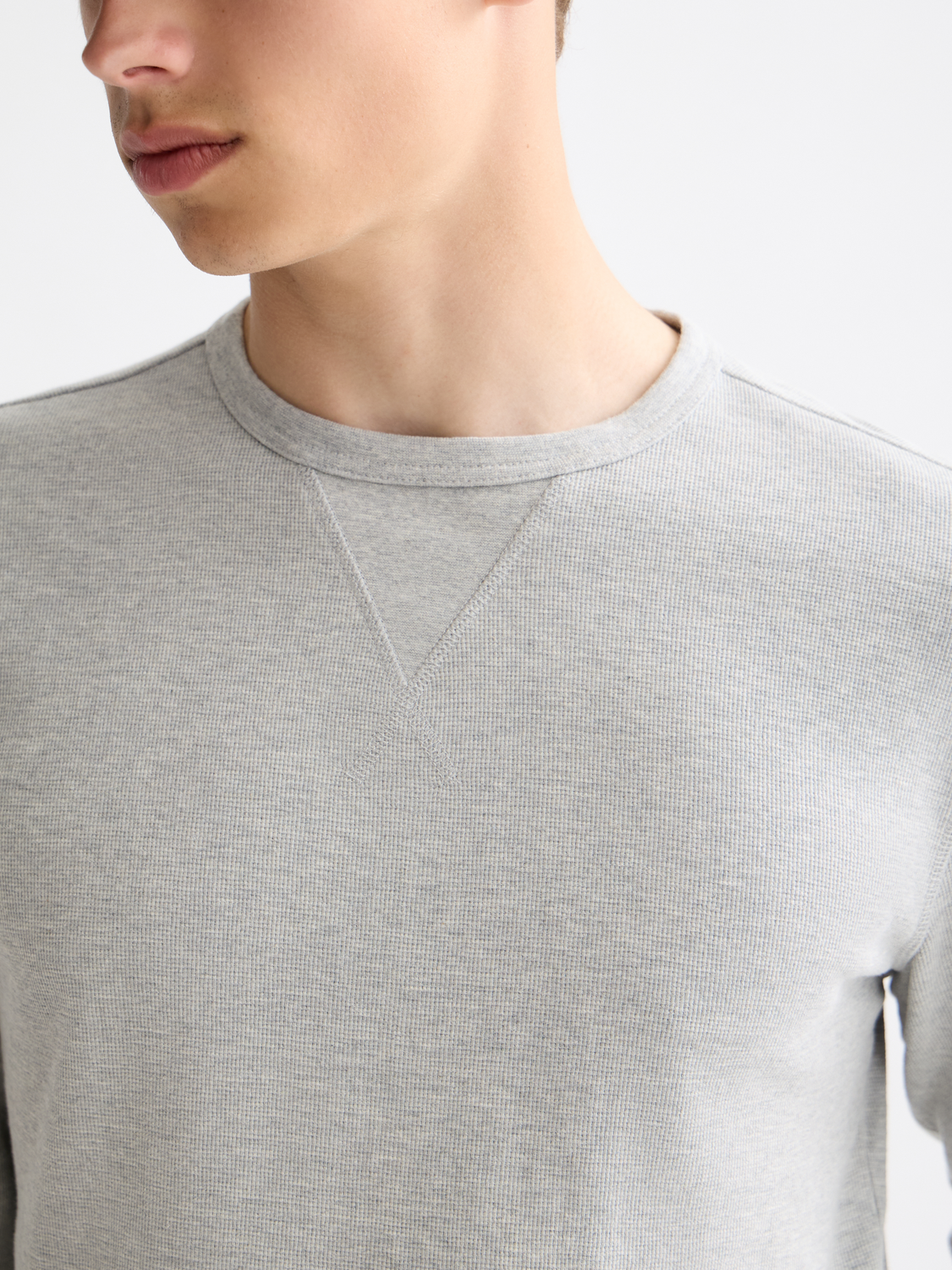 Long-sleeved Scotch & Soda waffle t-shirt in beige with textured fabric and classic fit, displayed flat.