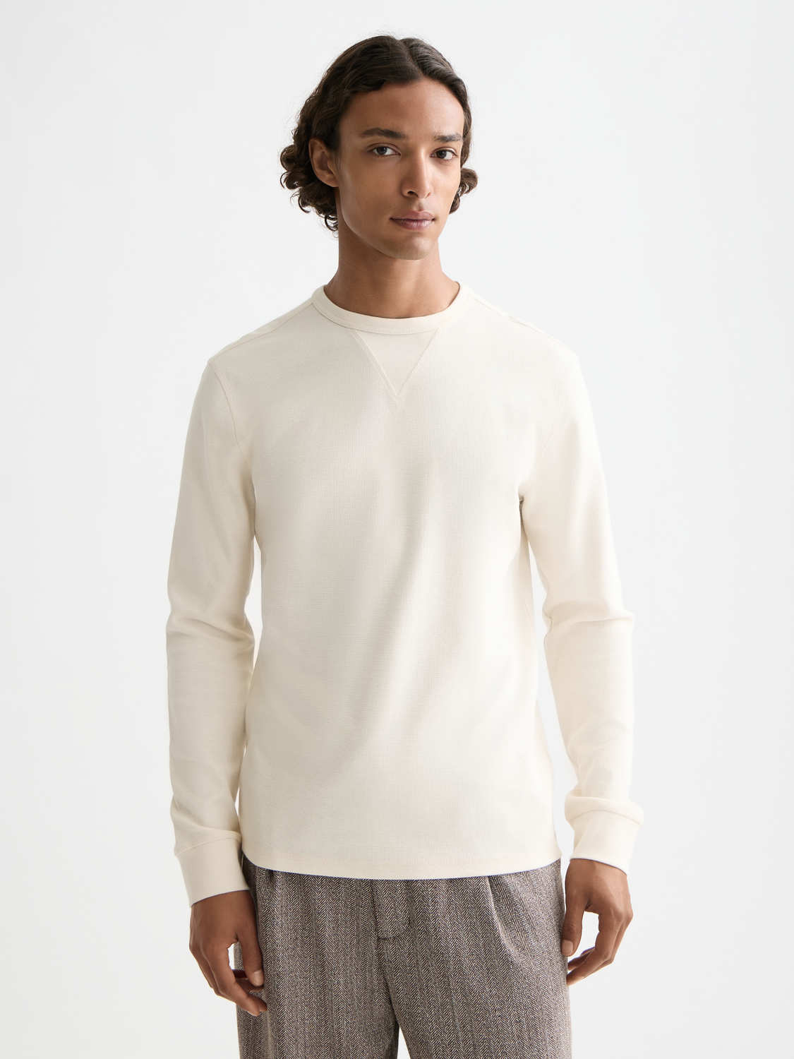 Scotch & Soda waffle long-sleeved T-shirt in cream with textured fabric and ribbed cuffs, displayed on a neutral background.