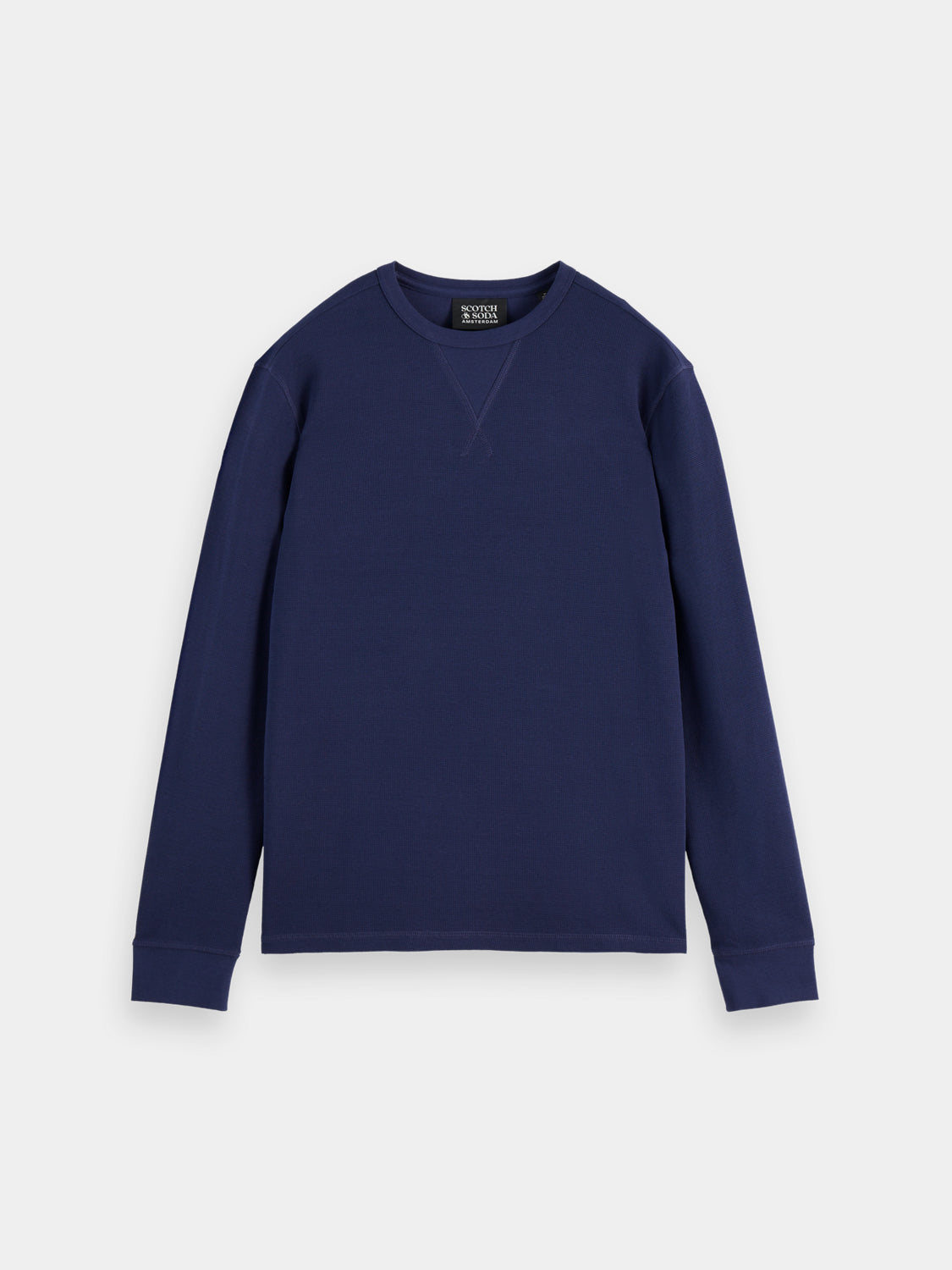 Scotch & Soda waffle long-sleeved T-shirt in beige with a relaxed fit and textured fabric, displayed on a plain background.