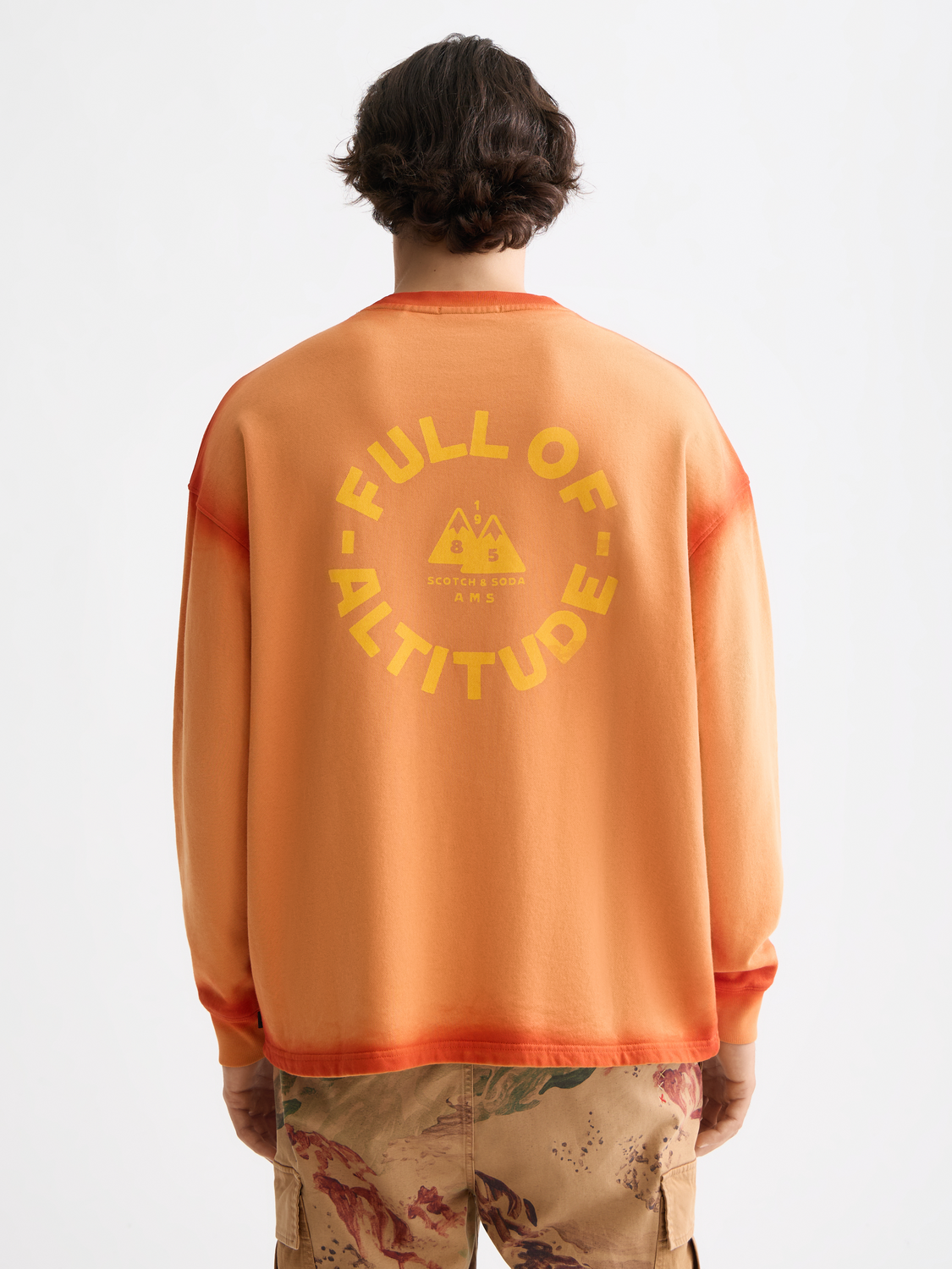 Scotch & Soda artwork sweatshirt with bold print and relaxed fit, displayed on a hanger.