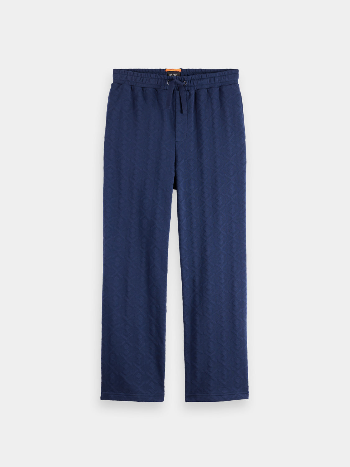 Jacquard terry sweatpants by Scotch & Soda, featuring a relaxed fit and stylish textured fabric, shown in a front view.