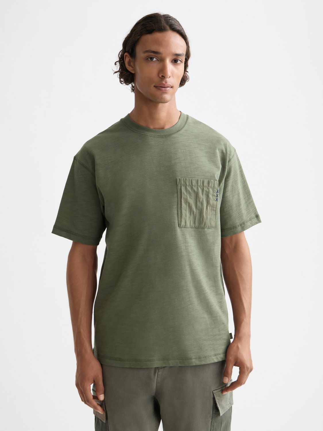 Patchwork pocket T-shirt from Scotch & Soda, short sleeve casual tee with colorful patchwork design and chest pocket.