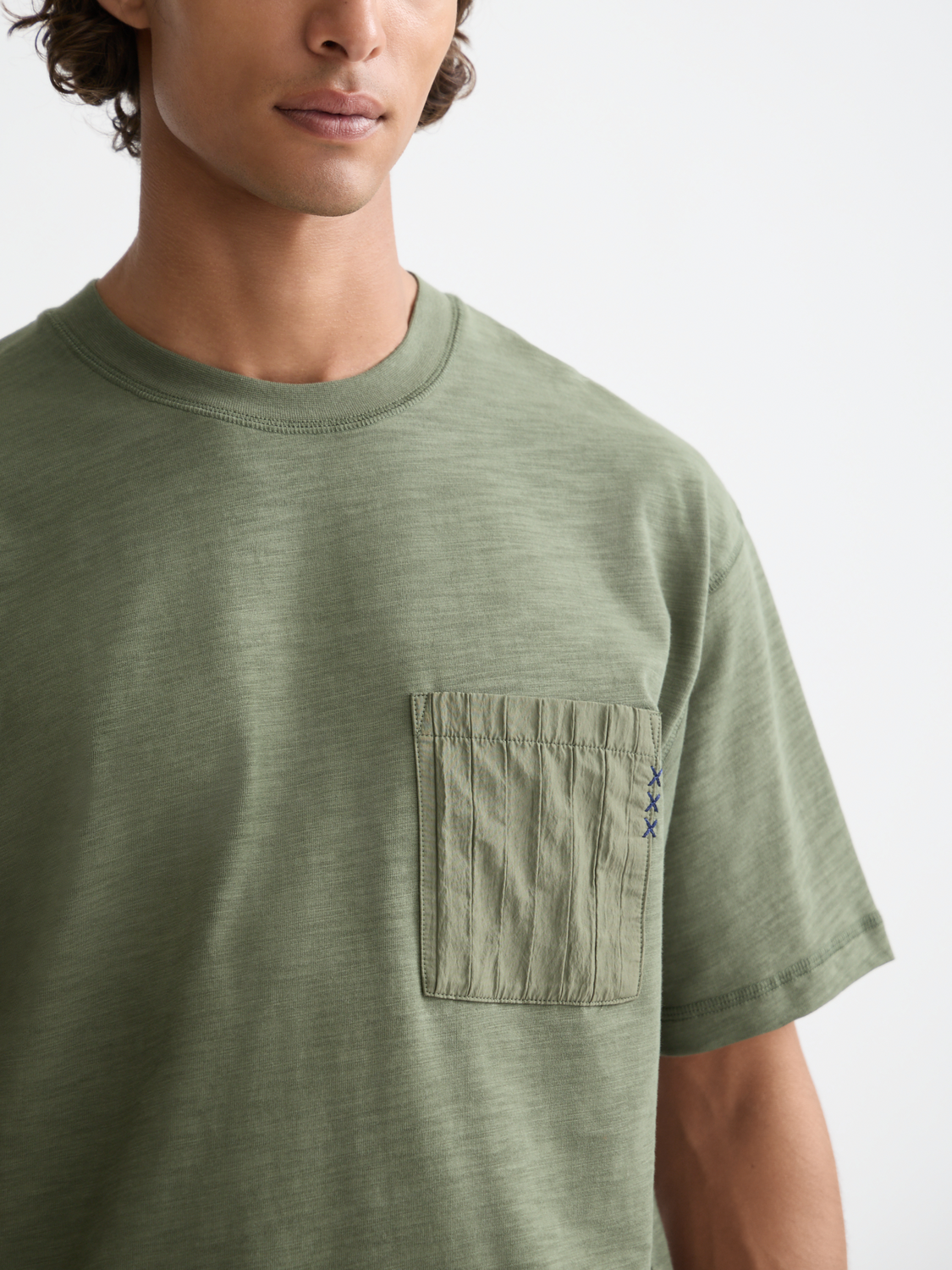 Patchwork pocket T-shirt from Scotch & Soda, short-sleeve tee with colorful patchwork design and chest pocket detail.