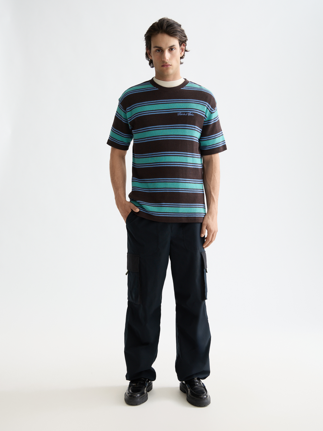 Light blue Scotch & Soda waffle T-shirt with short sleeves and crew neckline, displayed flat on a white background.