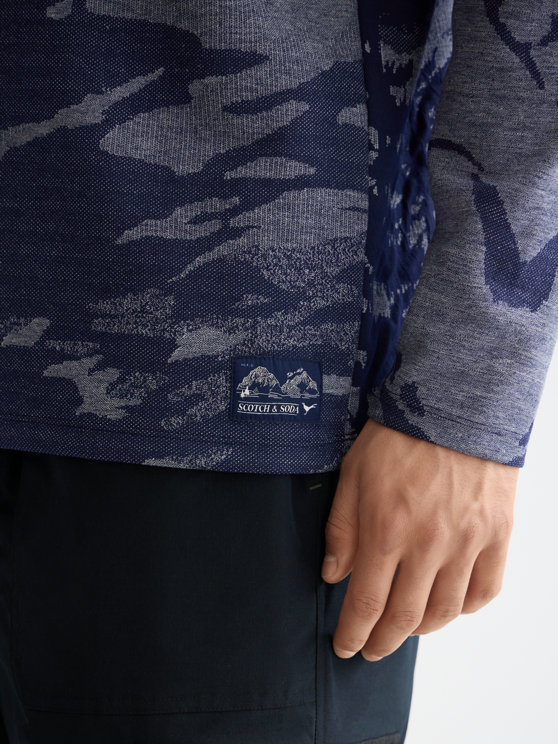 Scotch & Soda jacquard knit sweats featuring detailed woven pattern and comfortable fit in a casual style.