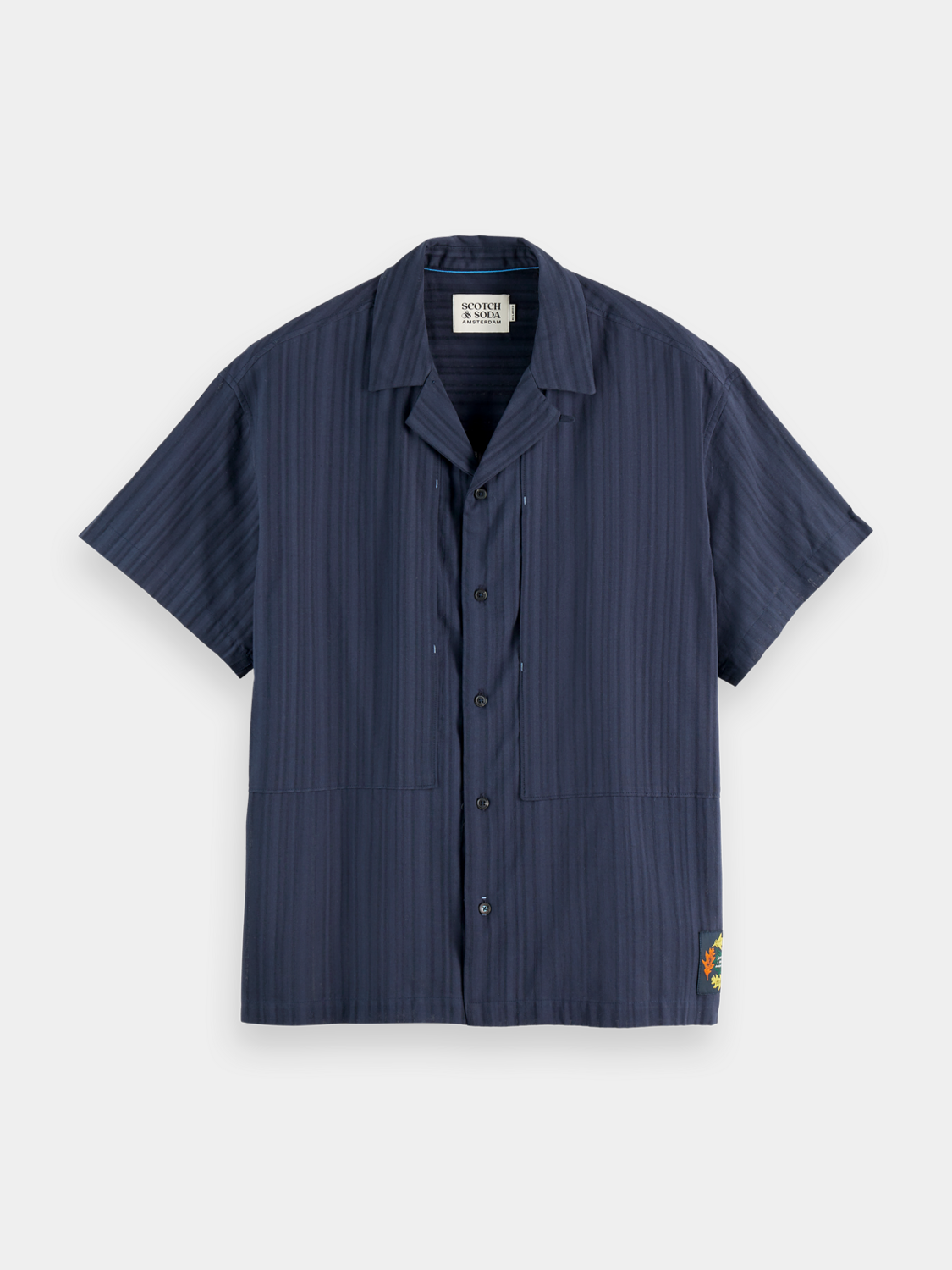 Striped short-sleeved shirt by Scotch & Soda, featuring a classic design with horizontal blue and white stripes.