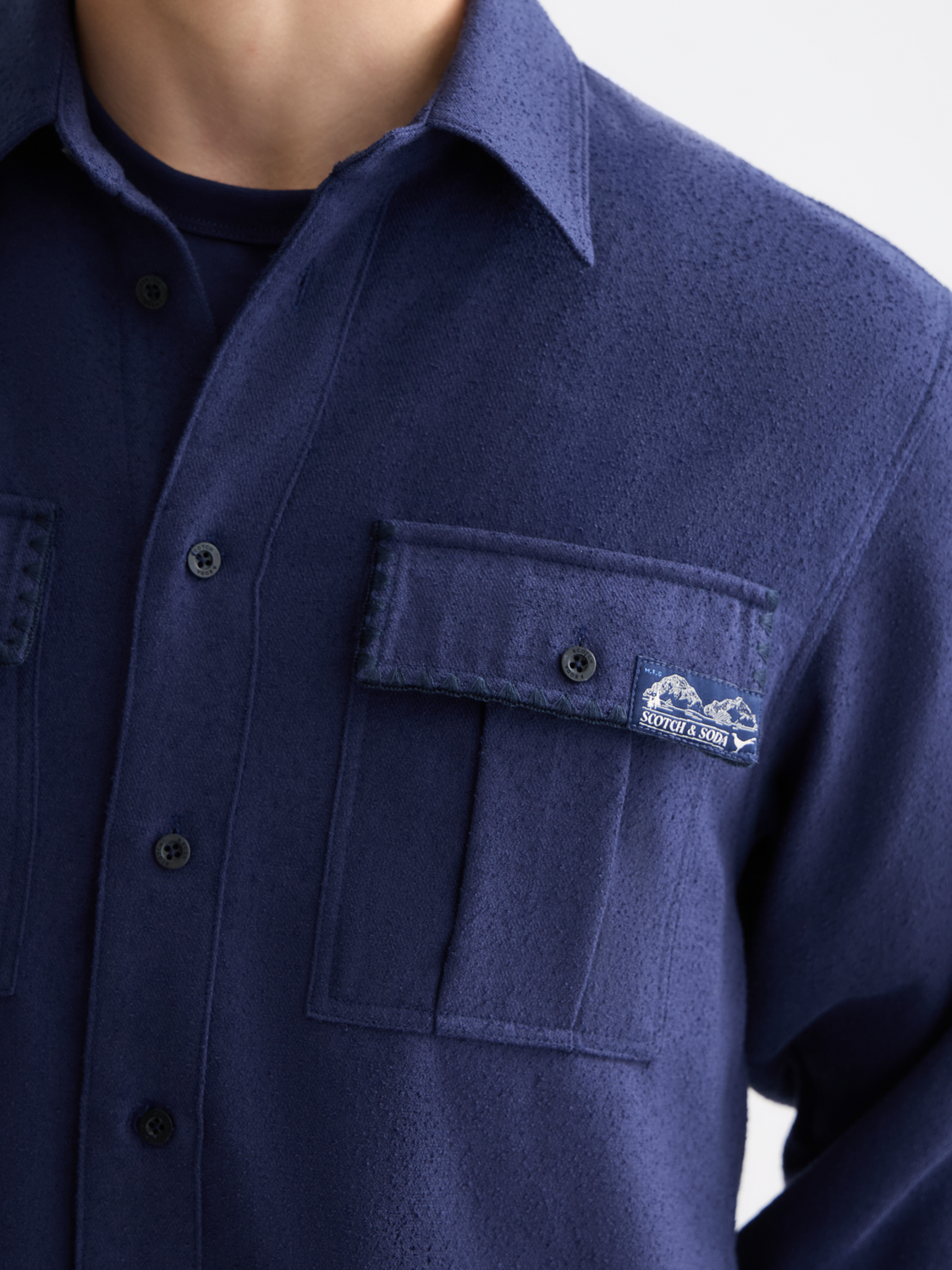 Long sleeve textured shirt by Scotch & Soda featuring a stylish pattern and classic fit in a neutral color.