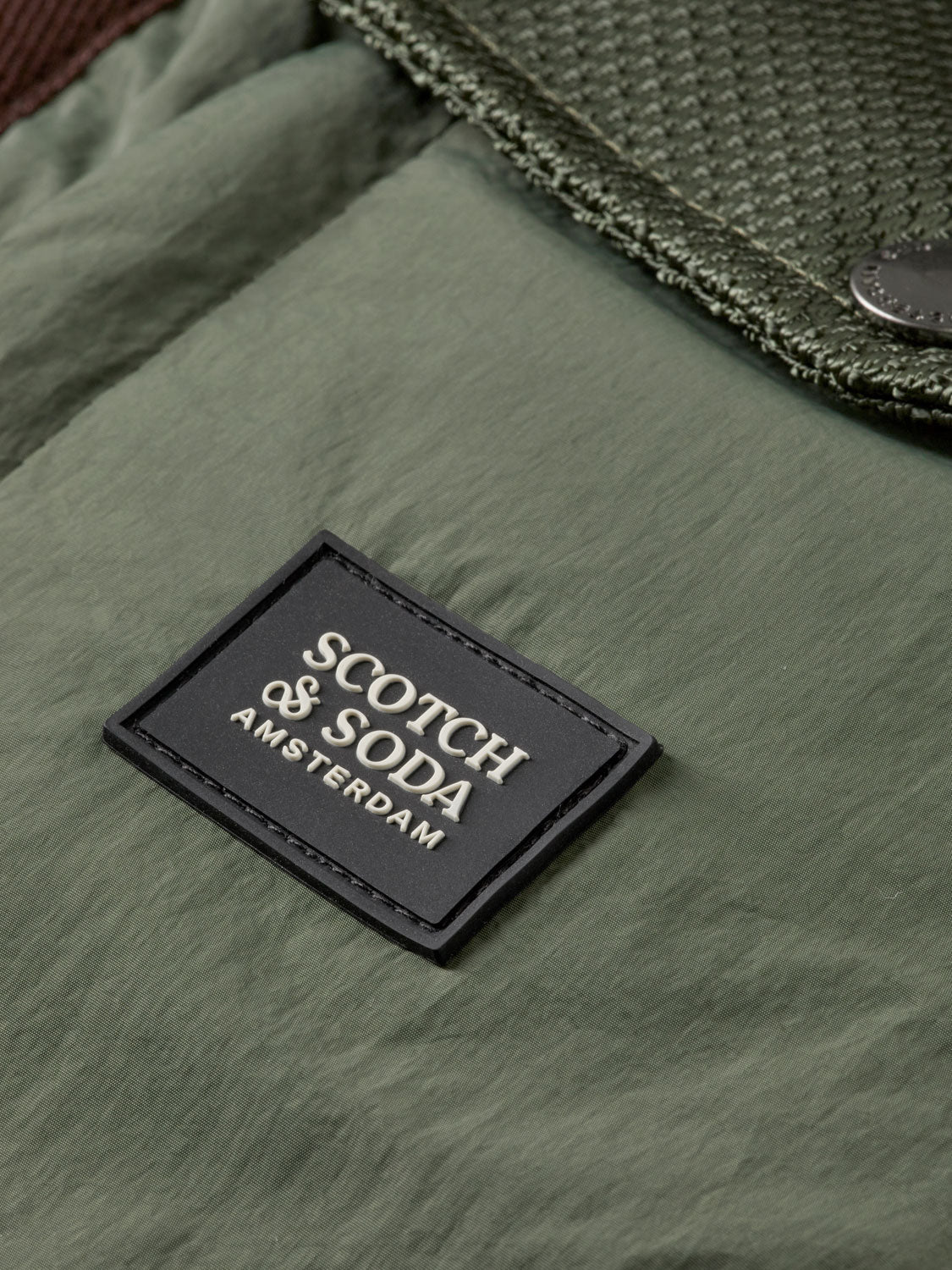 Blue hooded puffer vest by Scotch & Soda, a stylish bodywarmer with quilted design and front zipper for warmth and comfort.