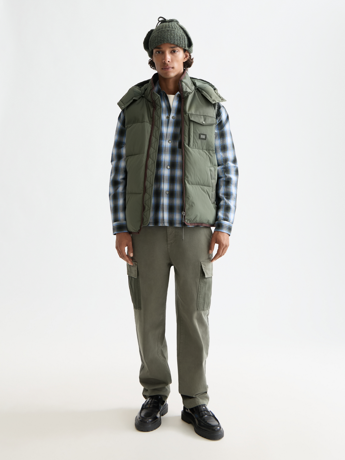 Scarlet hooded puffer vest by Scotch & Soda, a stylish bodywarmer with a zip front and quilted design for warmth and comfort.