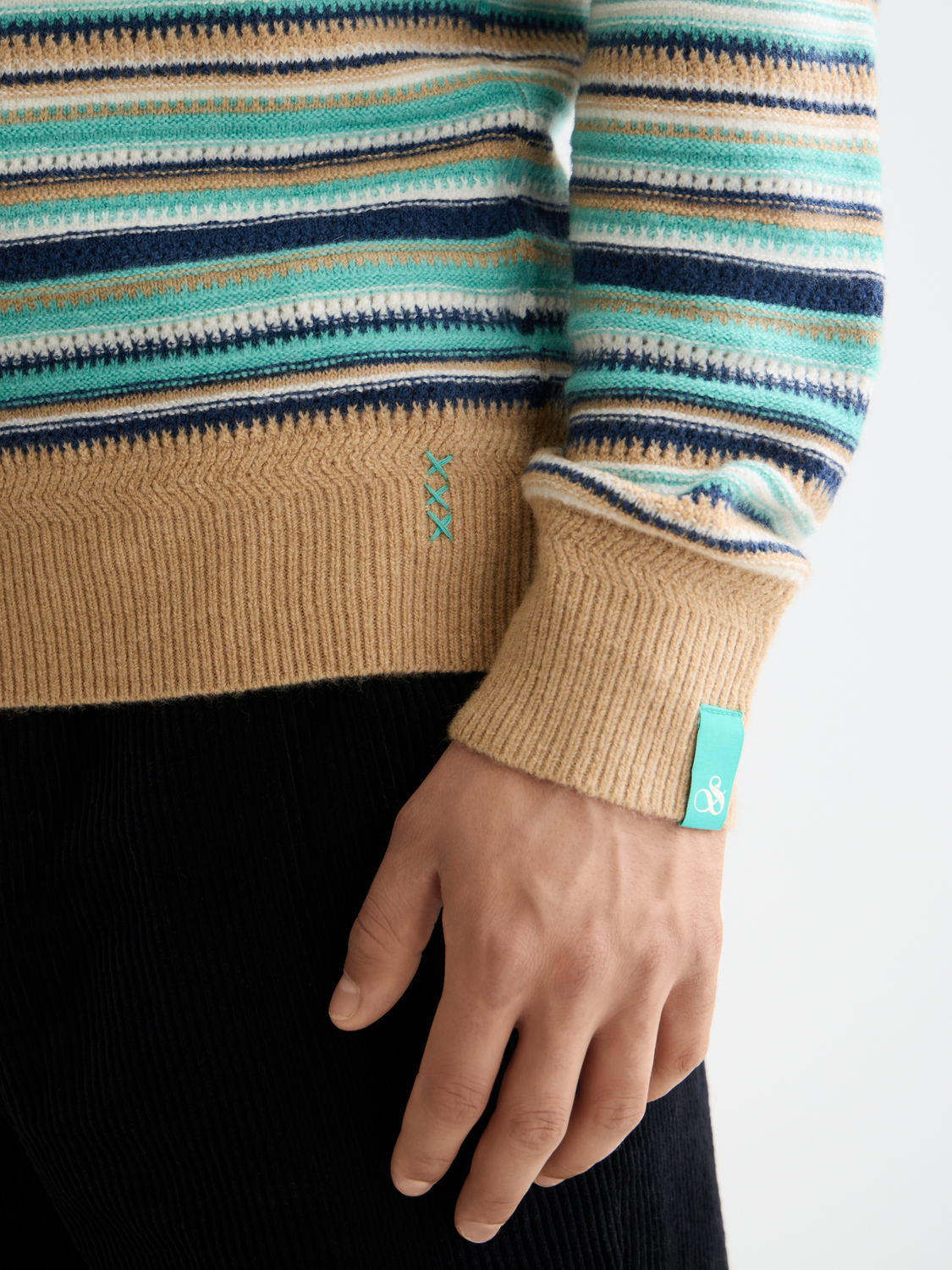 Striped Scotch & Soda knitwear pullover featuring a classic pattern and cozy fit, ideal for casual winter wear.