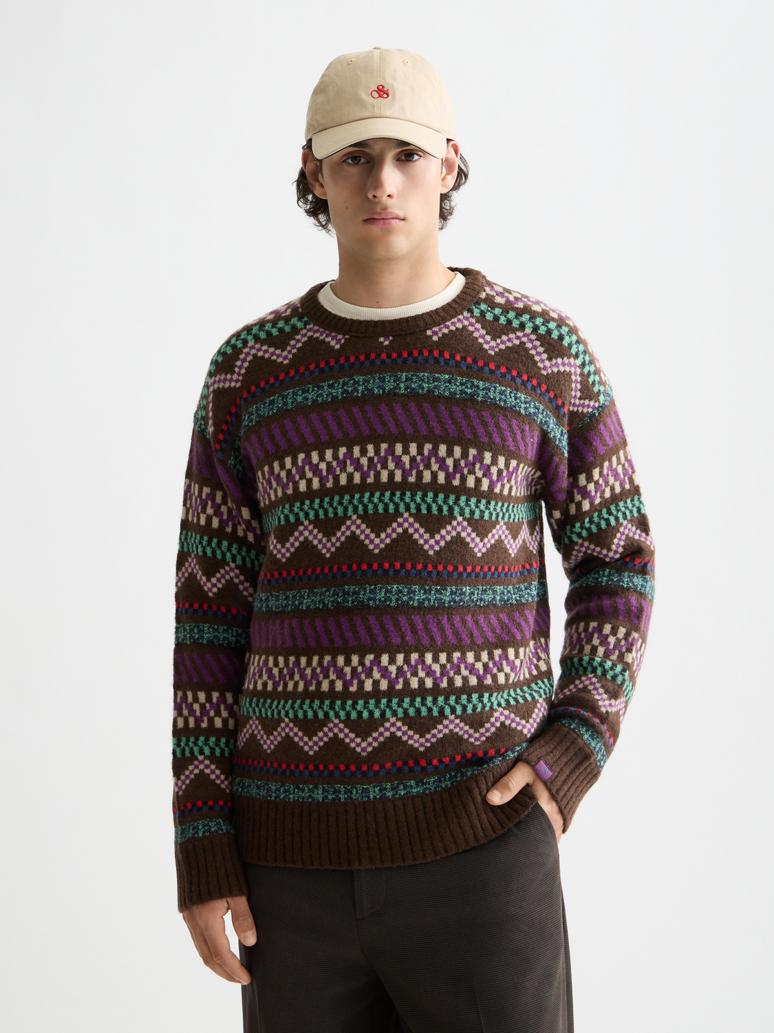 Scotch & Soda jacquard knitted pullover featuring intricate patterns and a cozy knit fabric, front view.