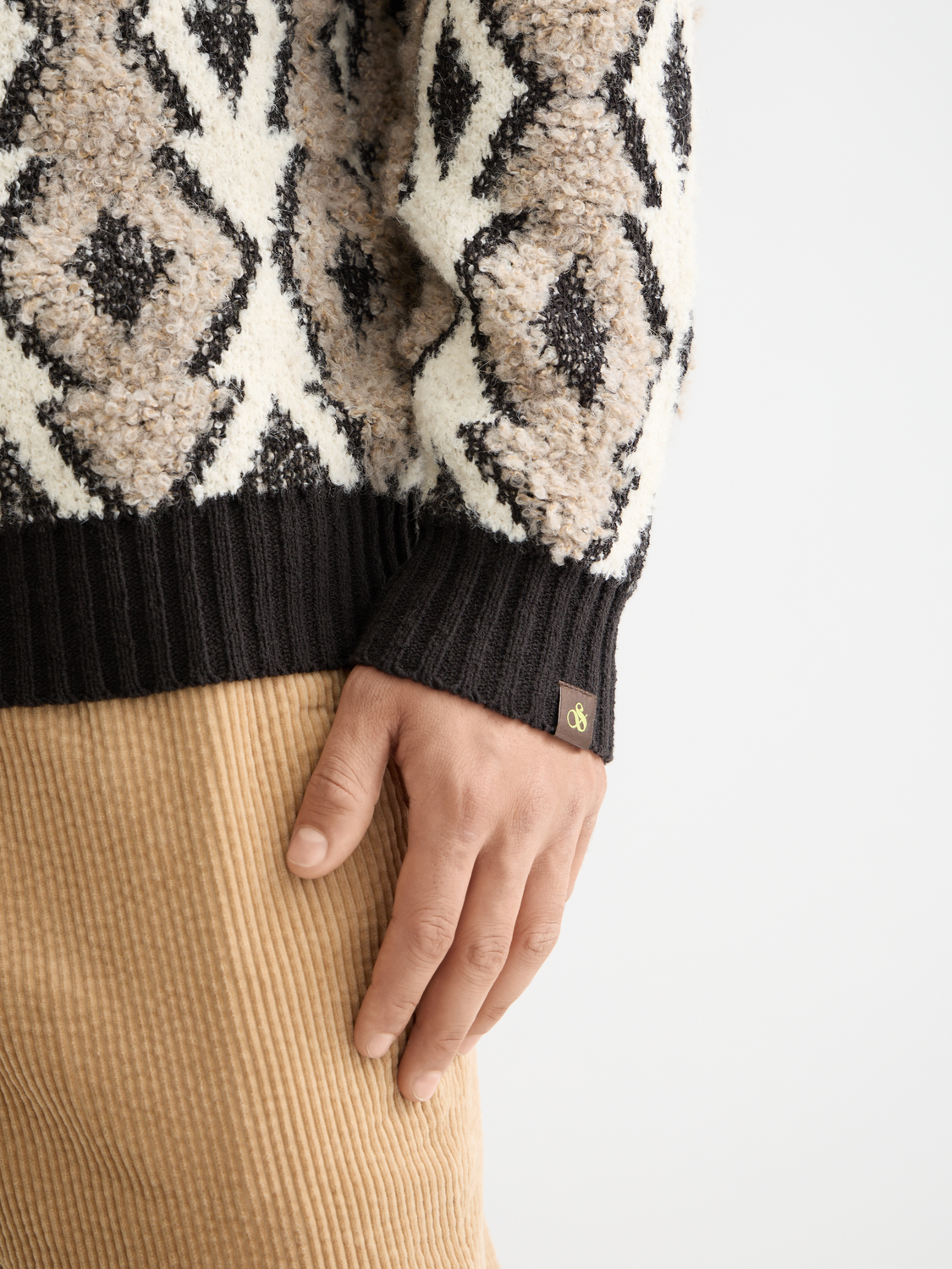 Scotch & Soda jacquard knitwear pullover in a detailed patterned design, shown on a neutral background.