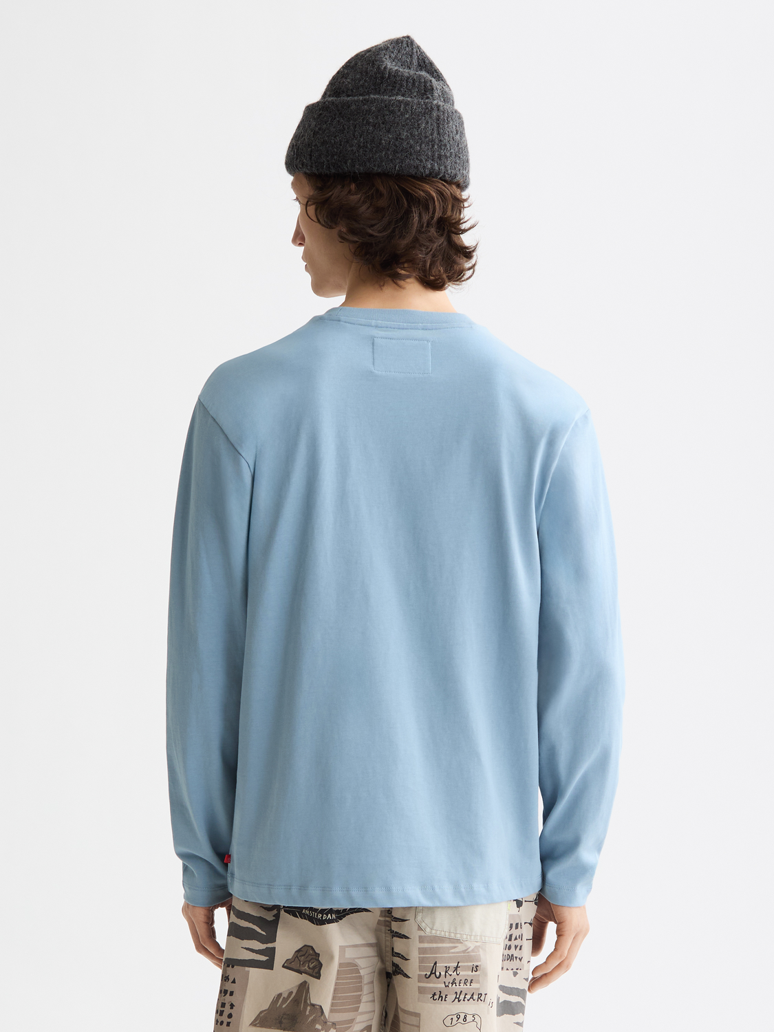 Long-sleeved Scotch & Soda artwork T-shirt featuring a colorful graphic design on the back.