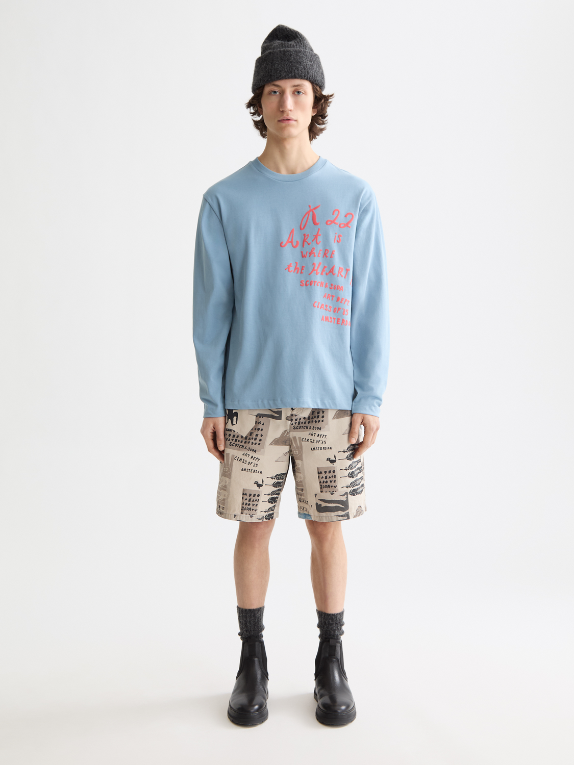 Long-sleeved artwork t-shirt by Scotch & Soda featuring colorful graphic design on the front.