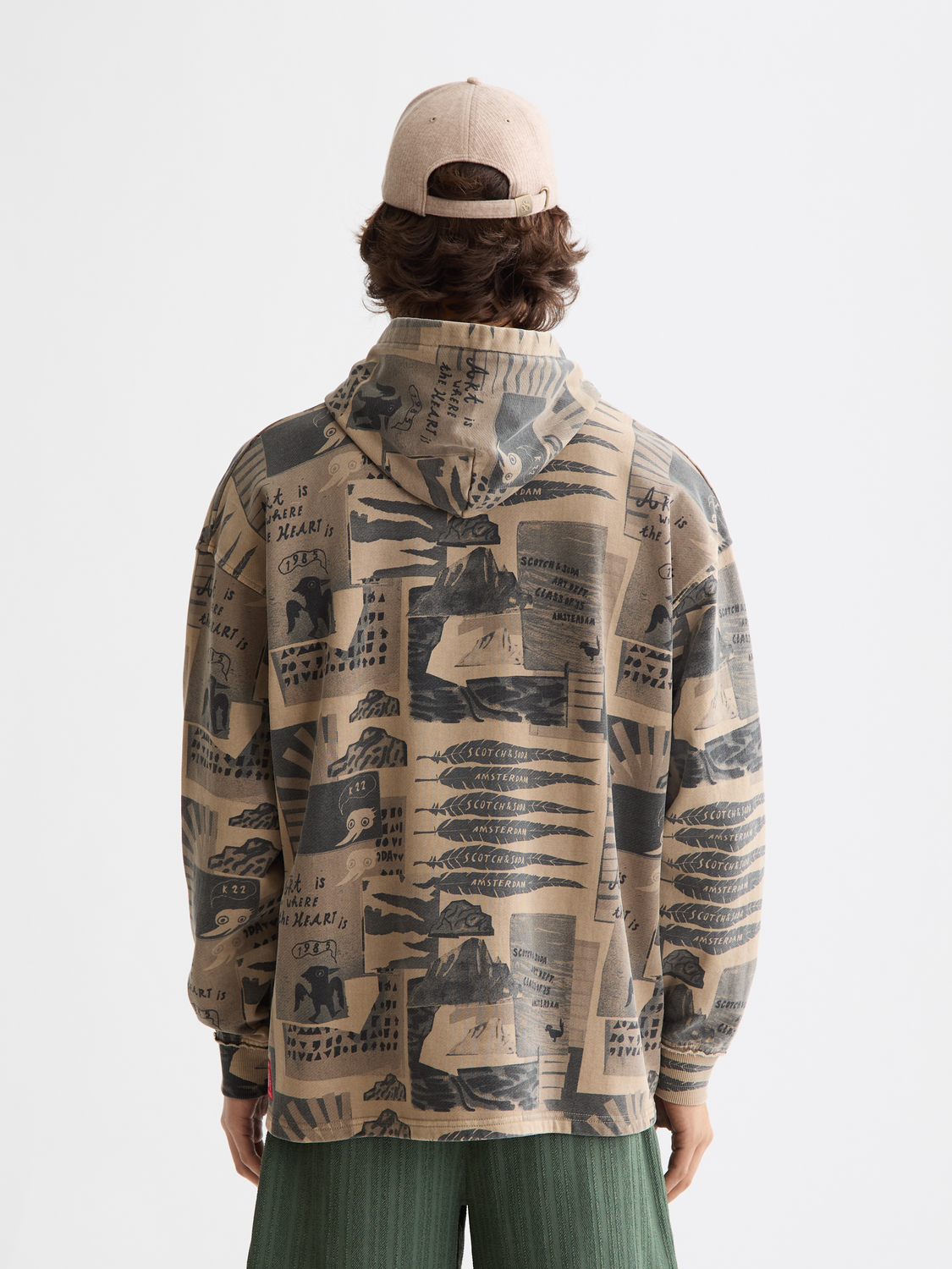 Printed hoodie from Scotch & Soda featuring a bold graphic design, shown in a back view on a soft sweats fabric.