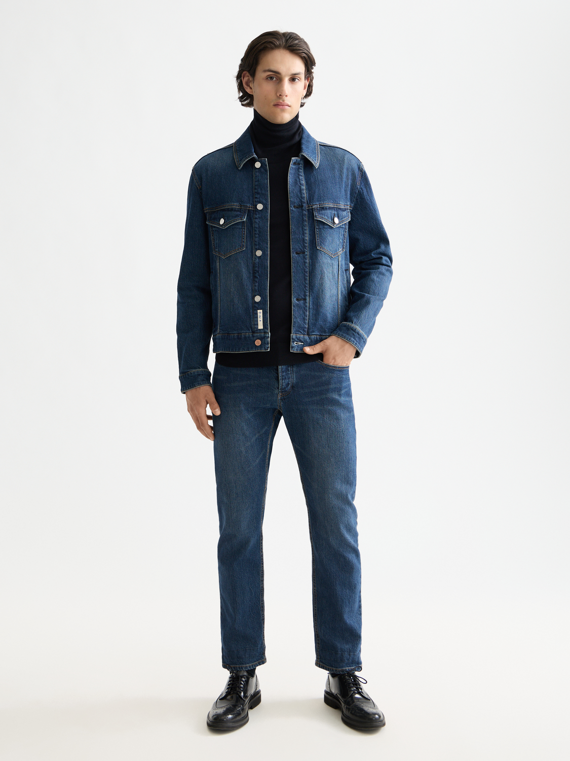 SCOTCH & SODA denim trucker jacket featuring classic design with button front and chest pockets, casual and stylish outerwear.