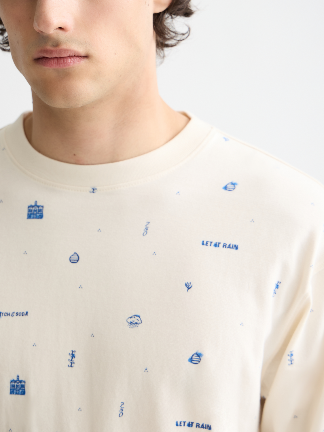 Printed long-sleeved Scotch & Soda T-shirt with colorful graphic design on soft fabric.