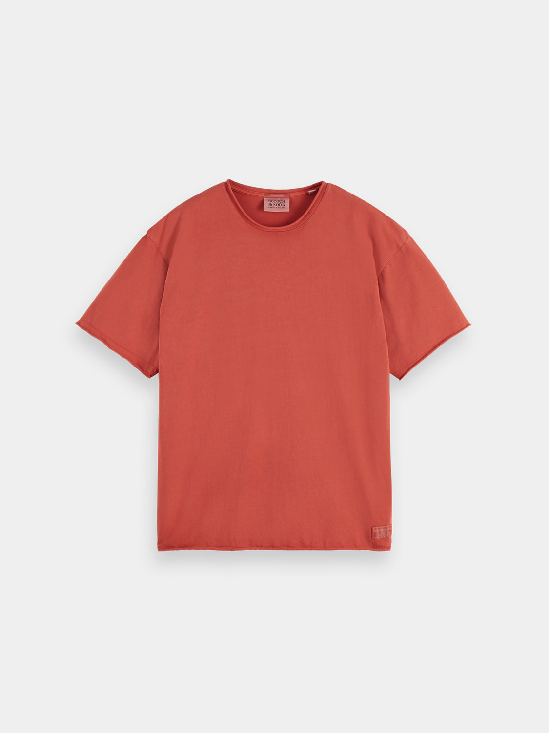 Raw edge Scotch & Soda short sleeve T-shirt displayed on a hanger, showcasing its casual, distressed neckline design.