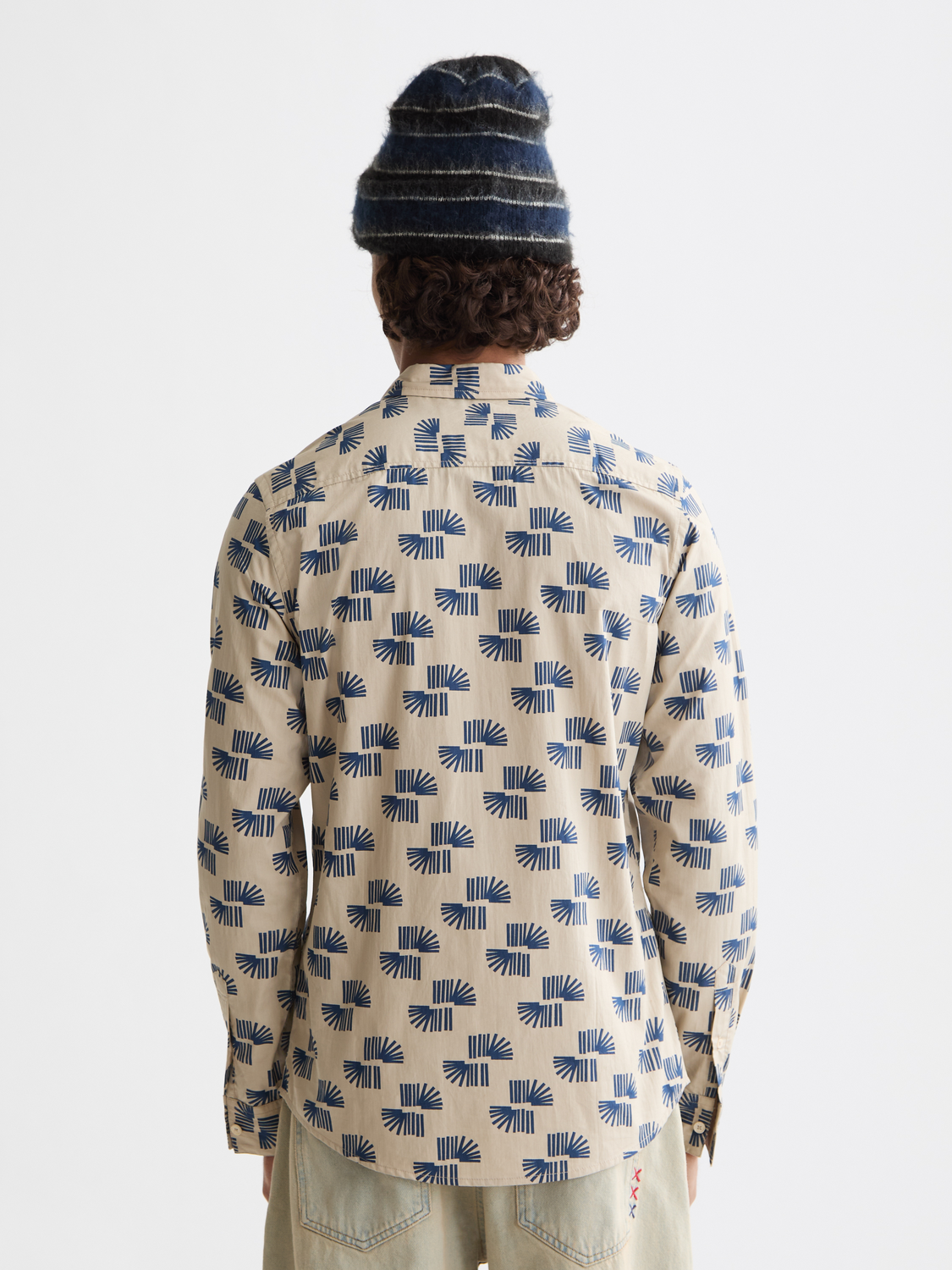 Long sleeve printed shirt by Scotch & Soda featuring bold floral patterns and a relaxed fit, shown from the back.