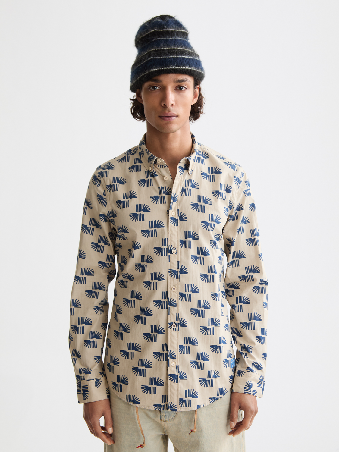Long sleeve printed shirt by Scotch & Soda featuring vibrant floral patterns and a classic collar design.