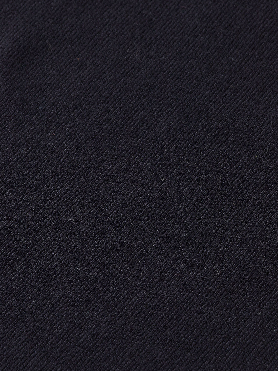 Blue knitted long-sleeved polo shirt by Scotch & Soda with a classic collar and ribbed cuffs, displayed on a plain background.