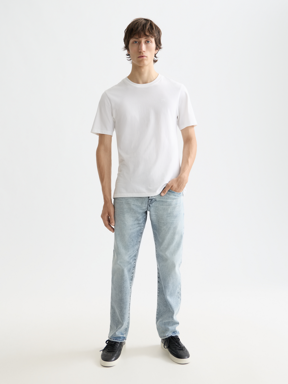 SCOTCH & SODA Zee straight-fit denim jeans displayed on a hanger, showcasing classic blue color and clean design.