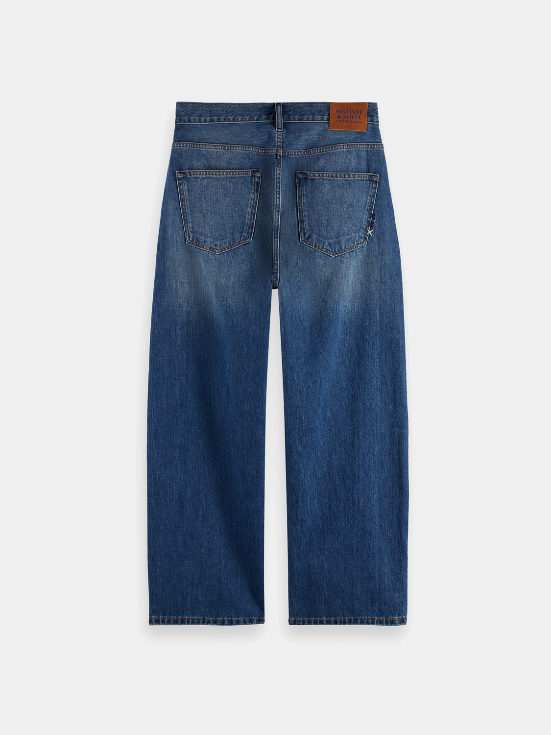 Scotch & Soda pitch loose-fit denim jeans showing classic blue denim fabric and relaxed fit style.