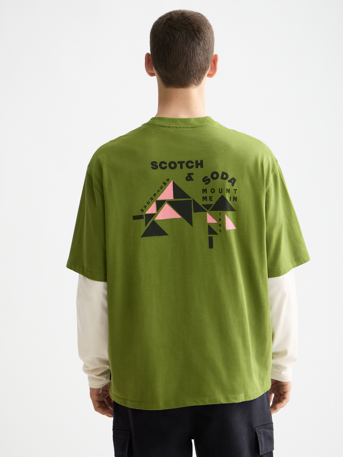 SCOTCH & SODA artwork short-sleeve t-shirt featuring a colorful graphic design on a black fabric background.