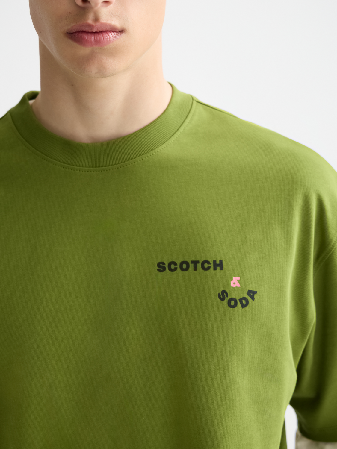 Scotch & Soda artwork short sleeve t-shirt with colorful graphic design on white fabric, casual men's summer tee.