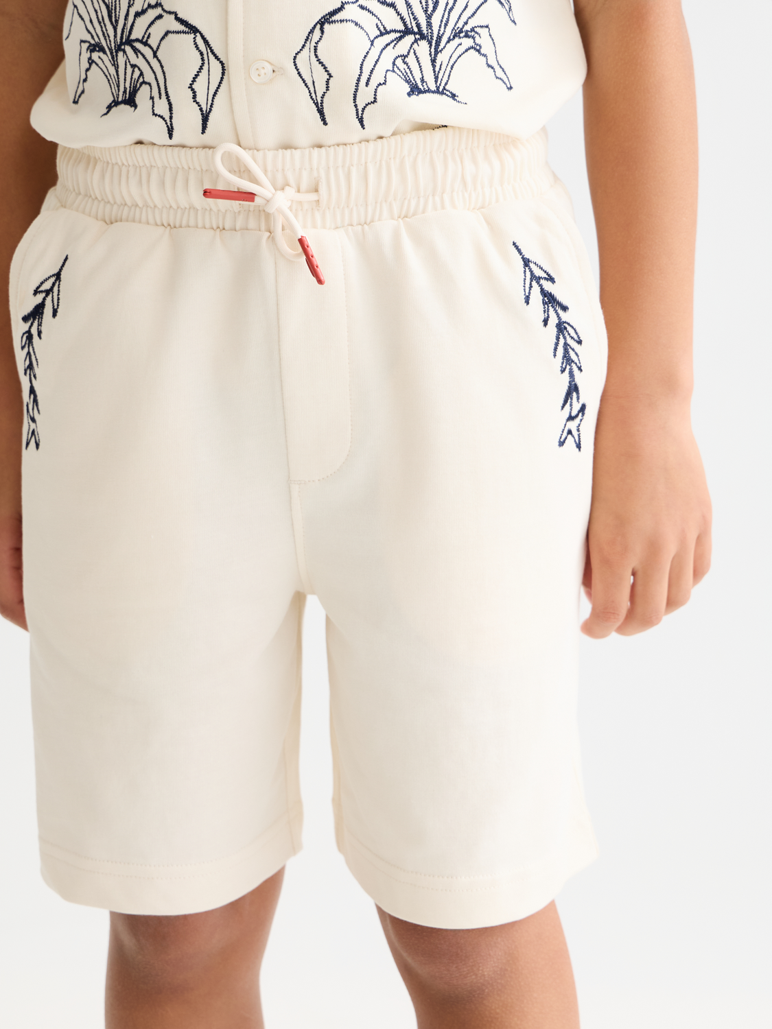 Kids' printed sweatshorts by Scotch & Soda featuring colorful patterns and a comfortable fit, ideal for casual wear.