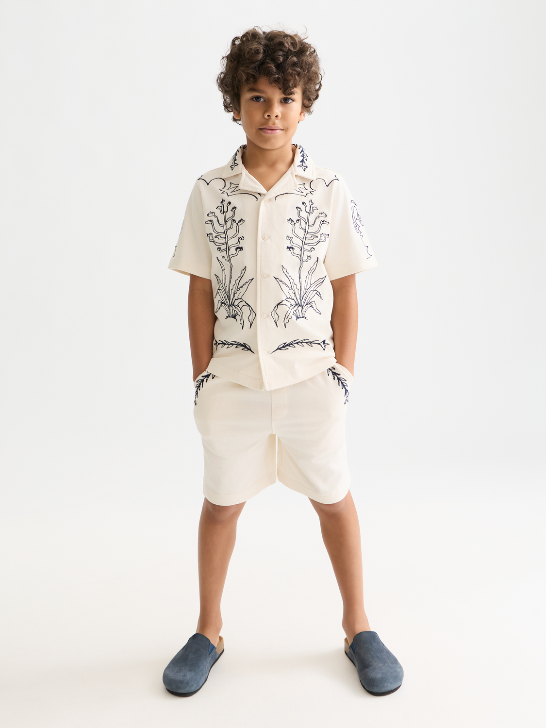 Kids' printed sweatshorts by Scotch & Soda featuring colorful patterns and comfortable fabric for casual wear.