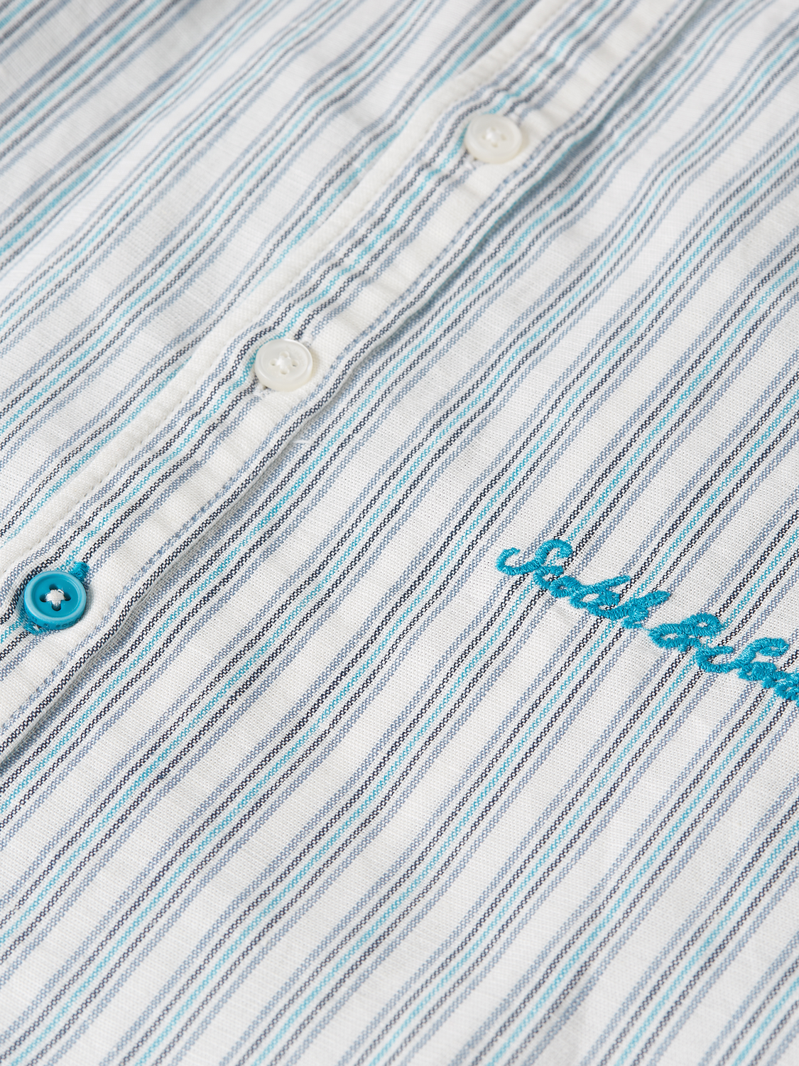 Kids' striped linen long-sleeve shirt by Scotch & Soda, featuring colorful vertical stripes and a casual fit.