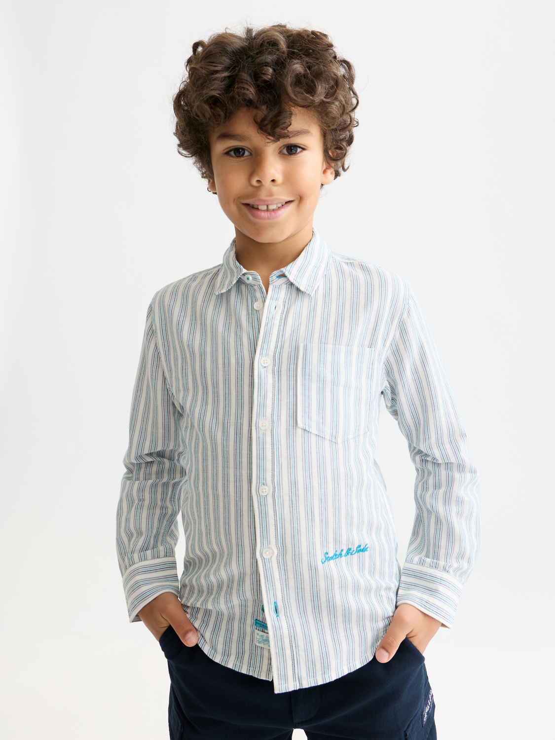 Kids striped linen long-sleeve shirt by Scotch & Soda, featuring colorful vertical stripes and a classic collar.