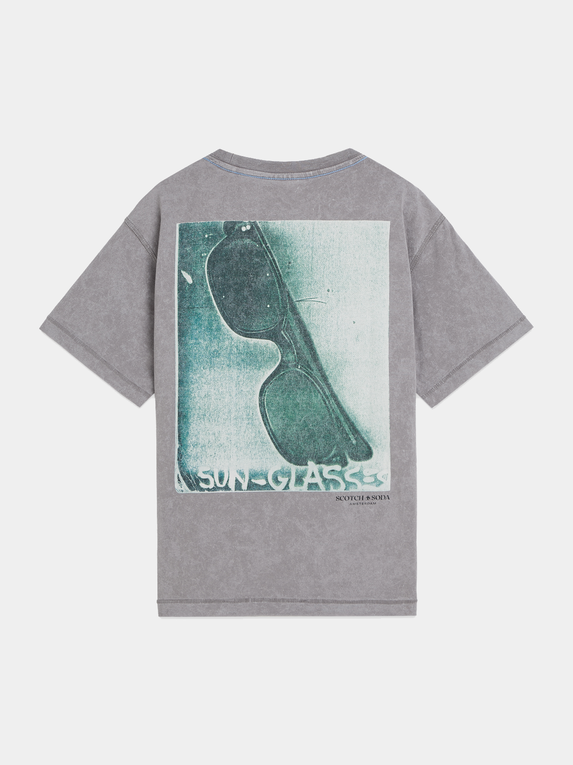 Kids' short sleeve t-shirt featuring S&S x Basquiat artwork by Scotch & Soda, with colorful graphic design on the front.