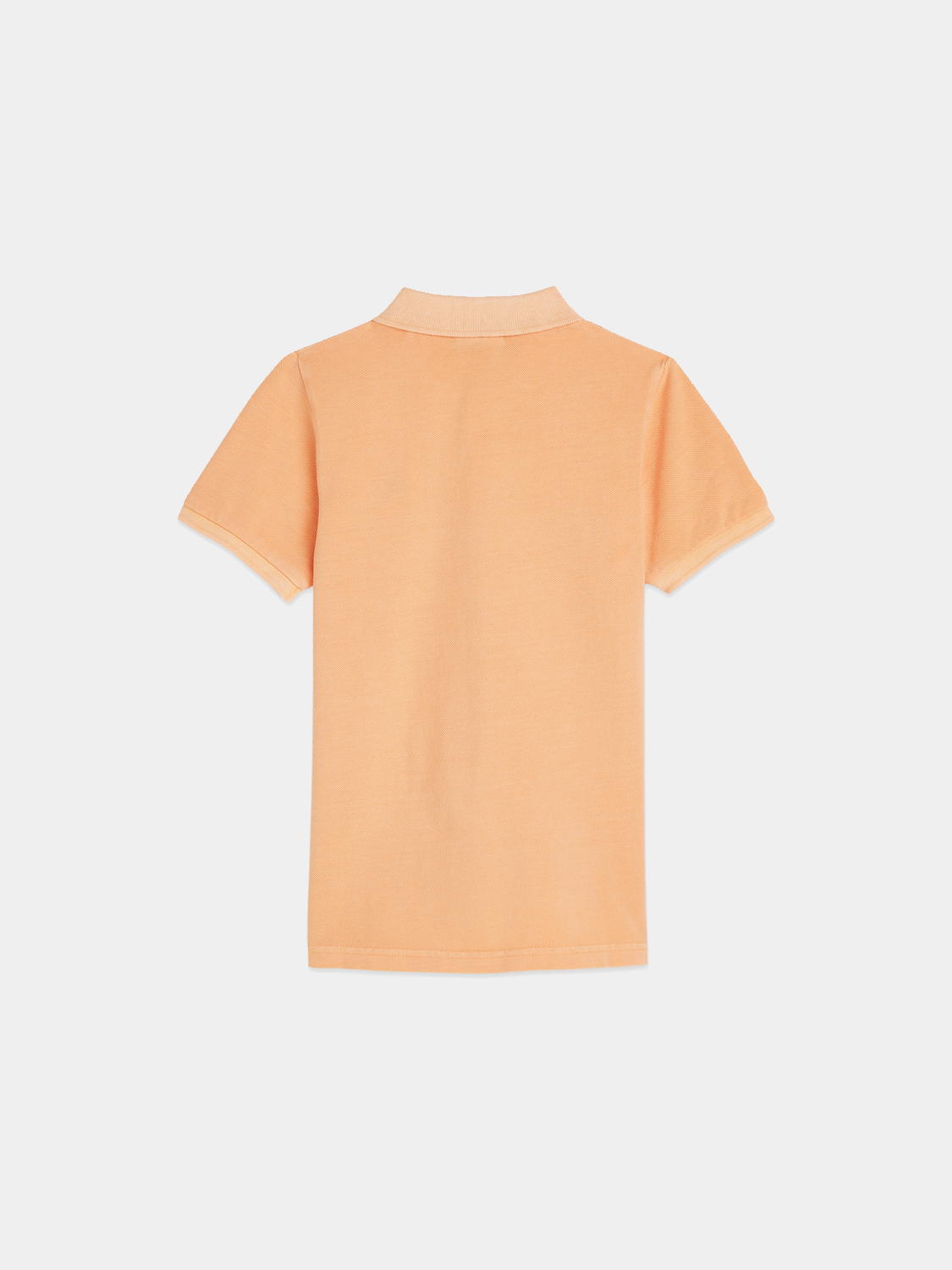 Kids' garment-dyed pique polo shirt by Scotch & Soda, featuring a classic collar and short sleeves.