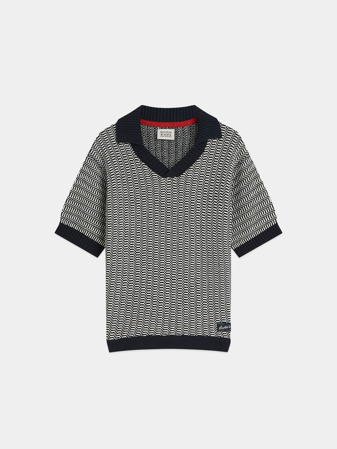 Kids' knitted polo shirt from Scotch & Soda, featuring a classic collar and textured knit fabric in vibrant colors.