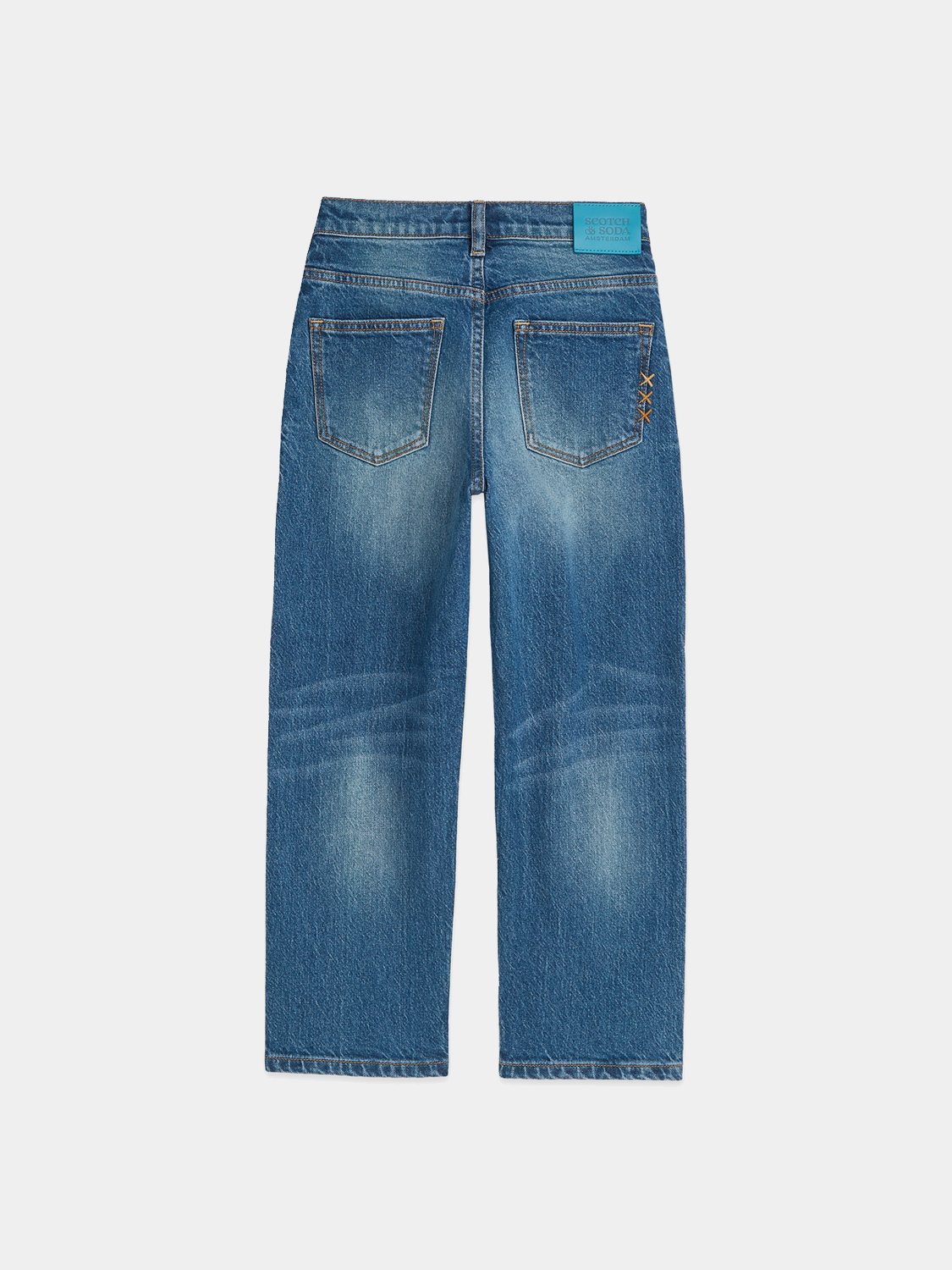 Kids' loose-fit denim jeans by Scotch & Soda, featuring a comfortable fit and classic blue wash.