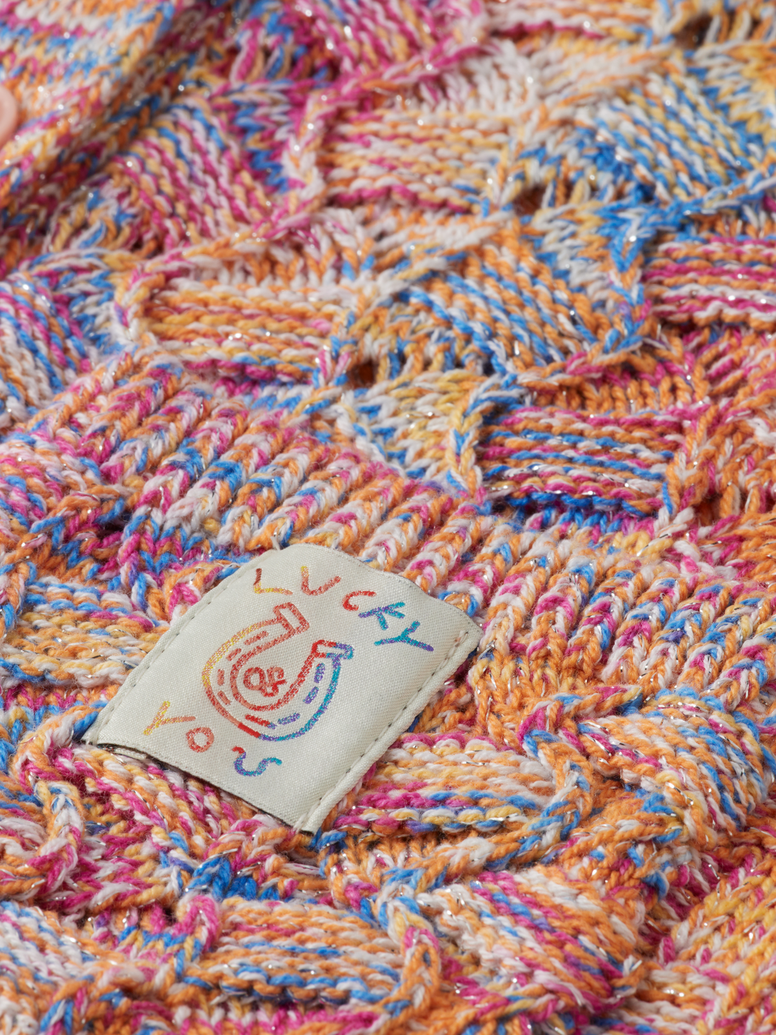 Kids oversized knit cardigan by Scotch & Soda featuring chunky knit fabric and a cozy, relaxed fit in vibrant colors.