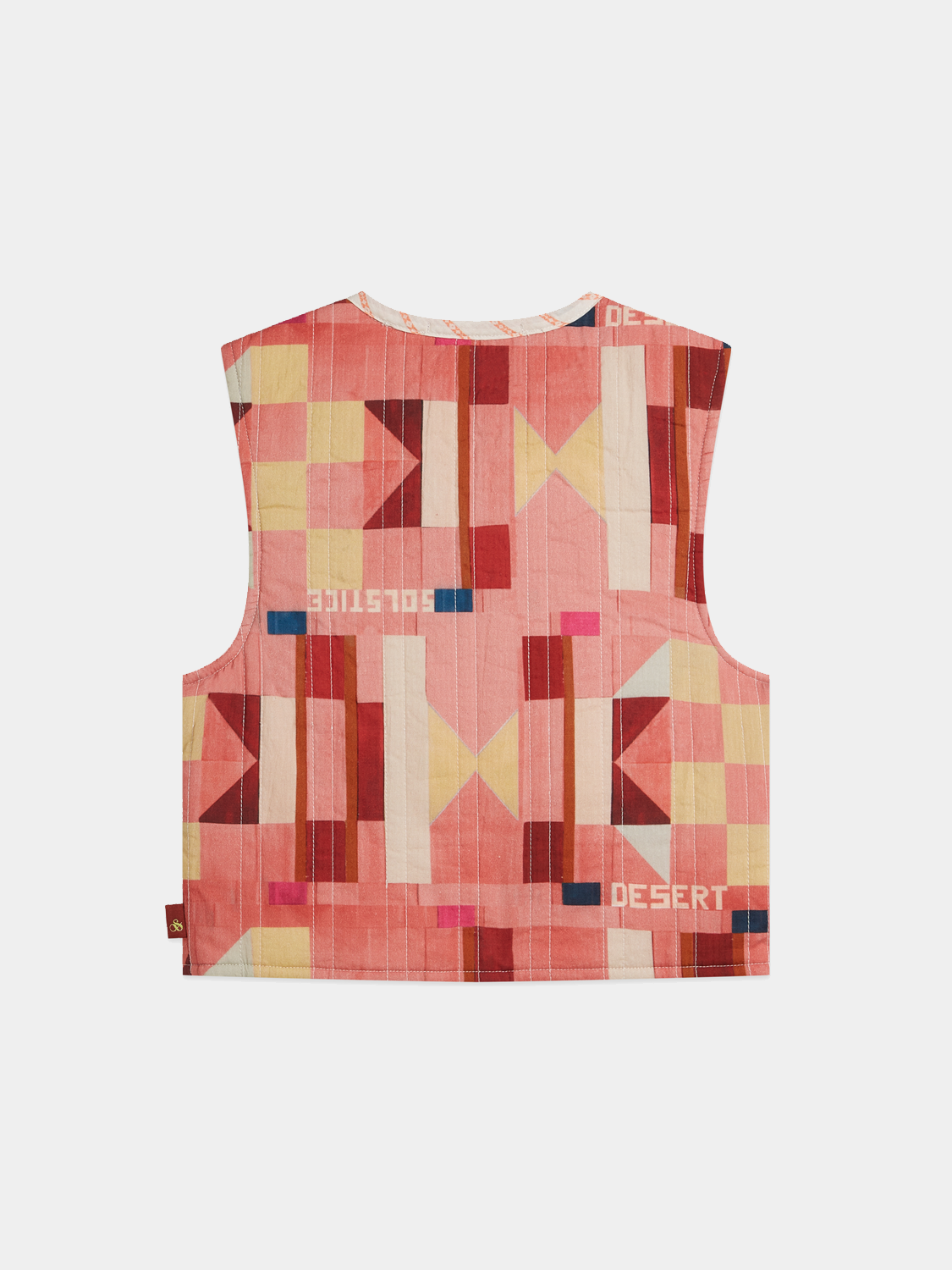 Kids reversible gilet by Scotch & Soda, showing both colorful and neutral sides, lightweight and cozy for outdoor wear.