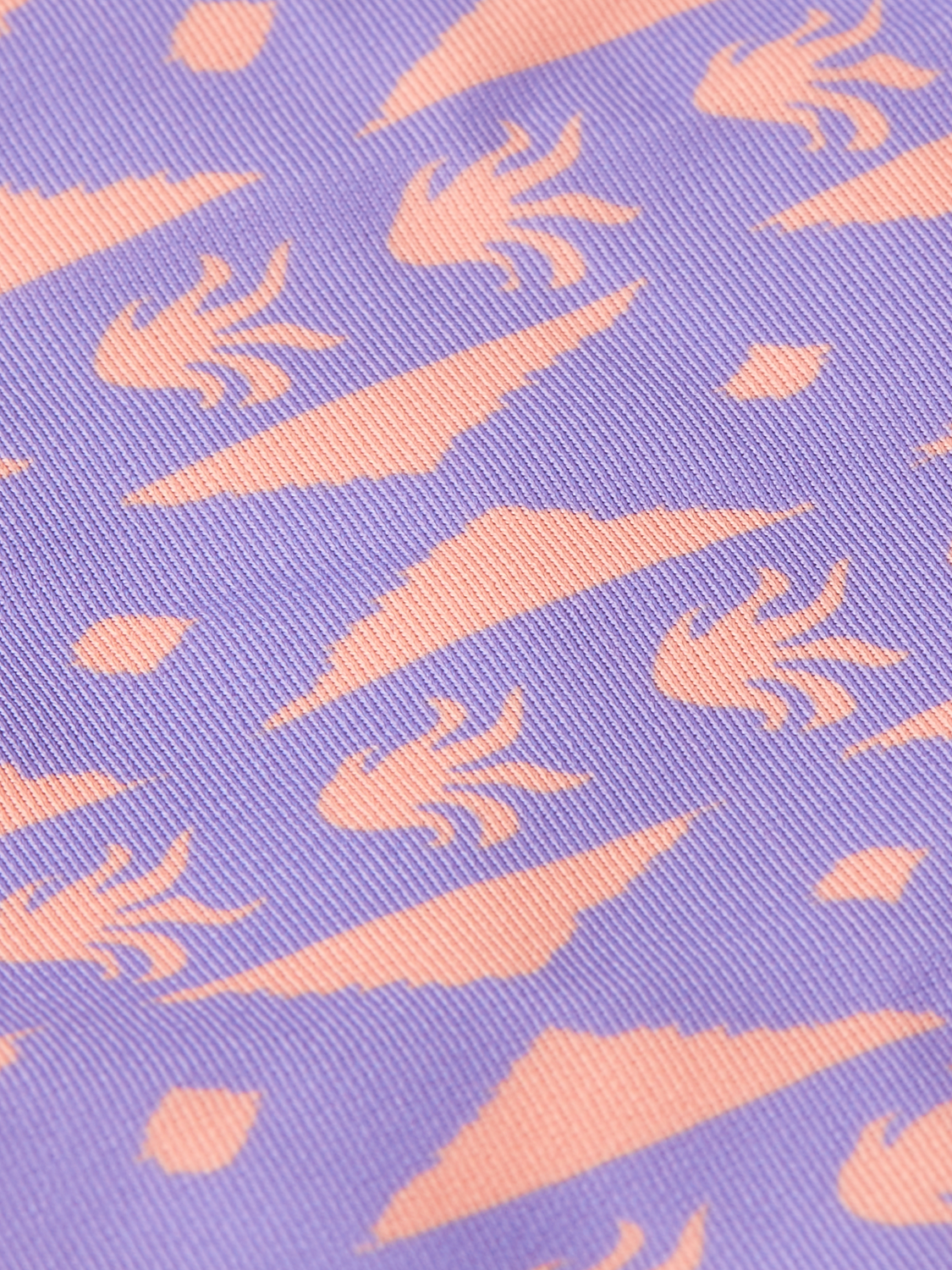 Kids printed swimsuit by Scotch & Soda, colorful swimwear with playful patterns perfect for summer beach or pool days.